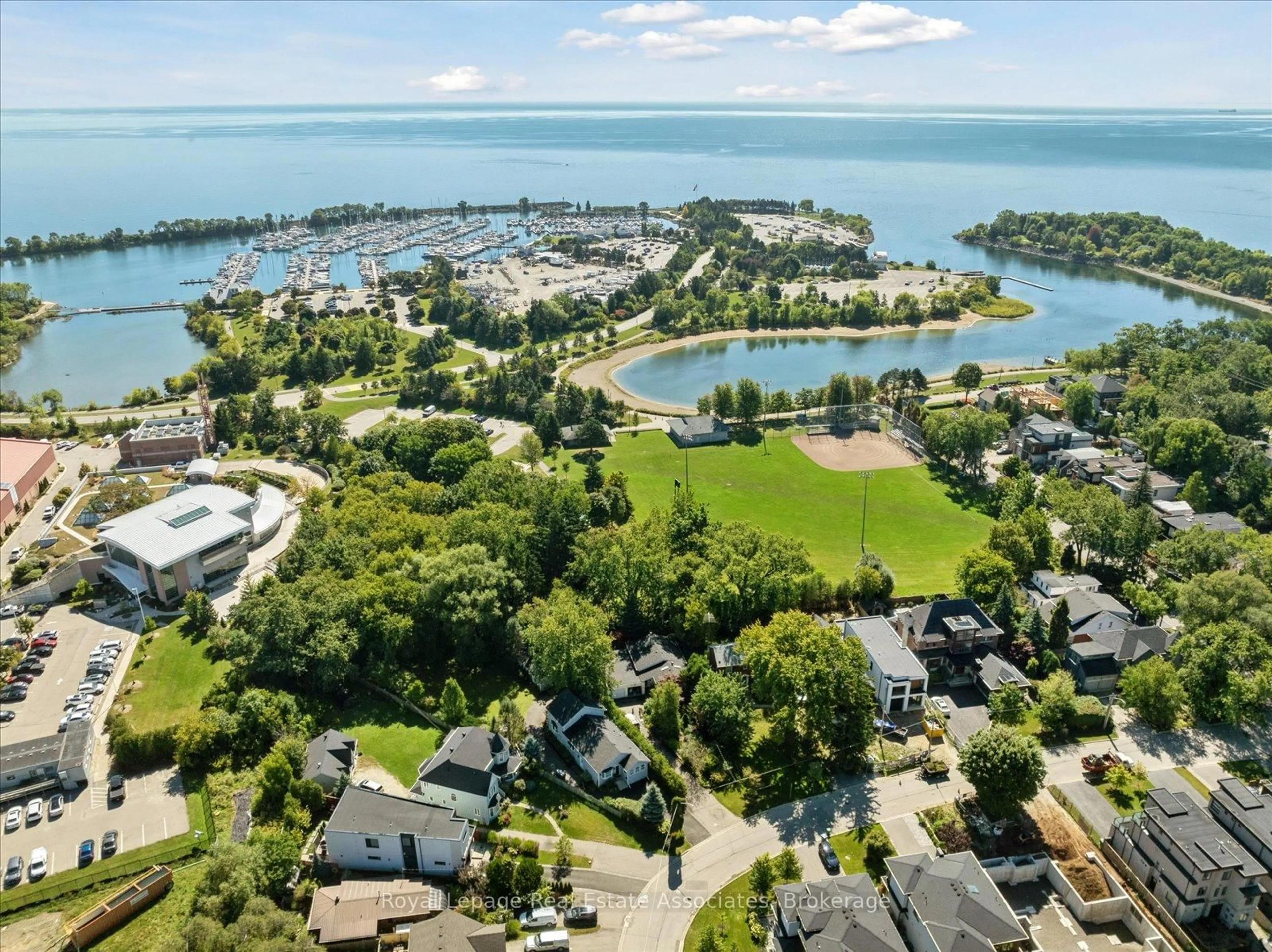 A pic from outside/outdoor area/front of a property/back of a property/a pic from drone, water/lake/river/ocean view for 708 Montbeck Cres, Mississauga Ontario L5G 1P3