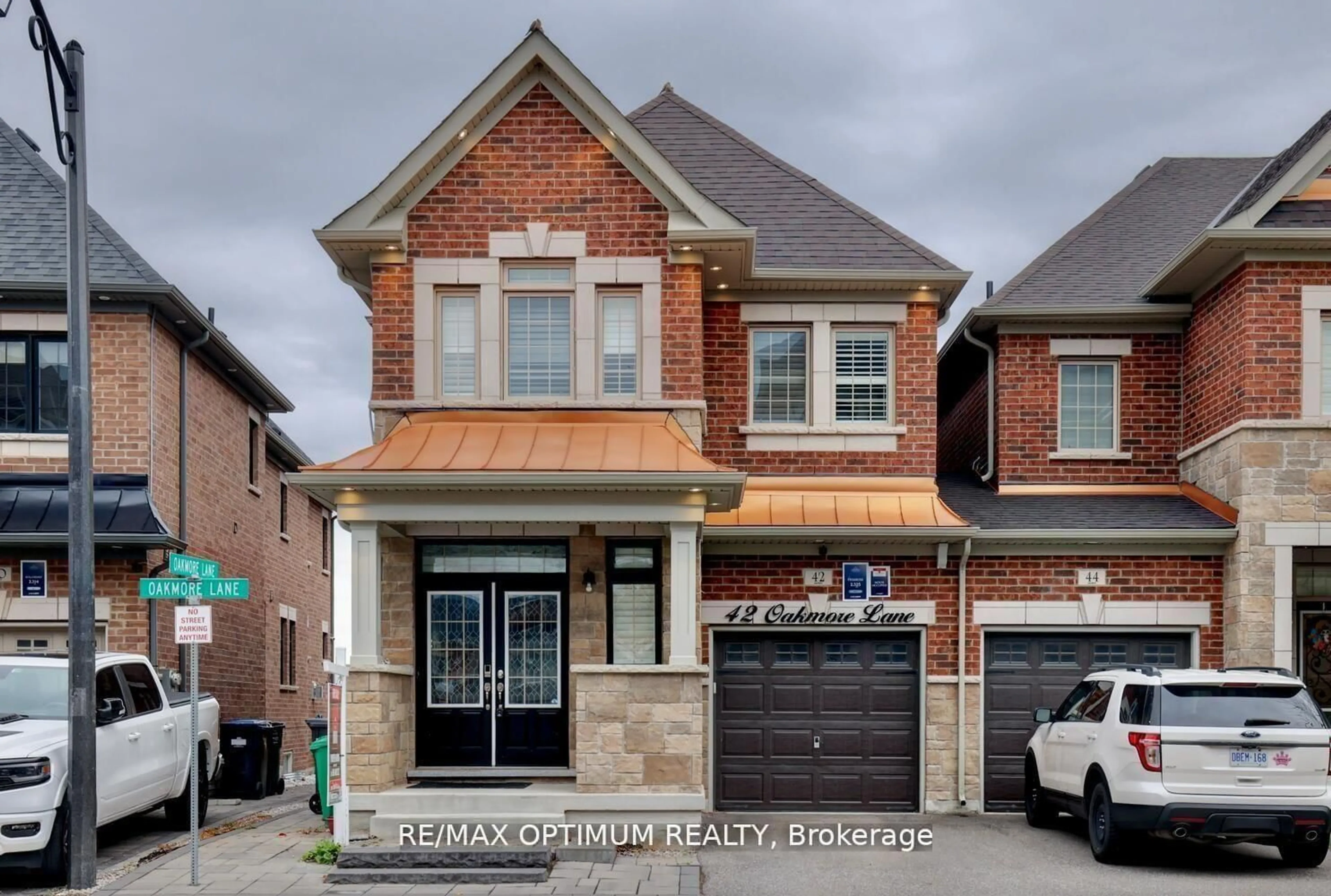 Home with brick exterior material, street for 42 OAKMORE Lane, Brampton Ontario L6Y 6H5