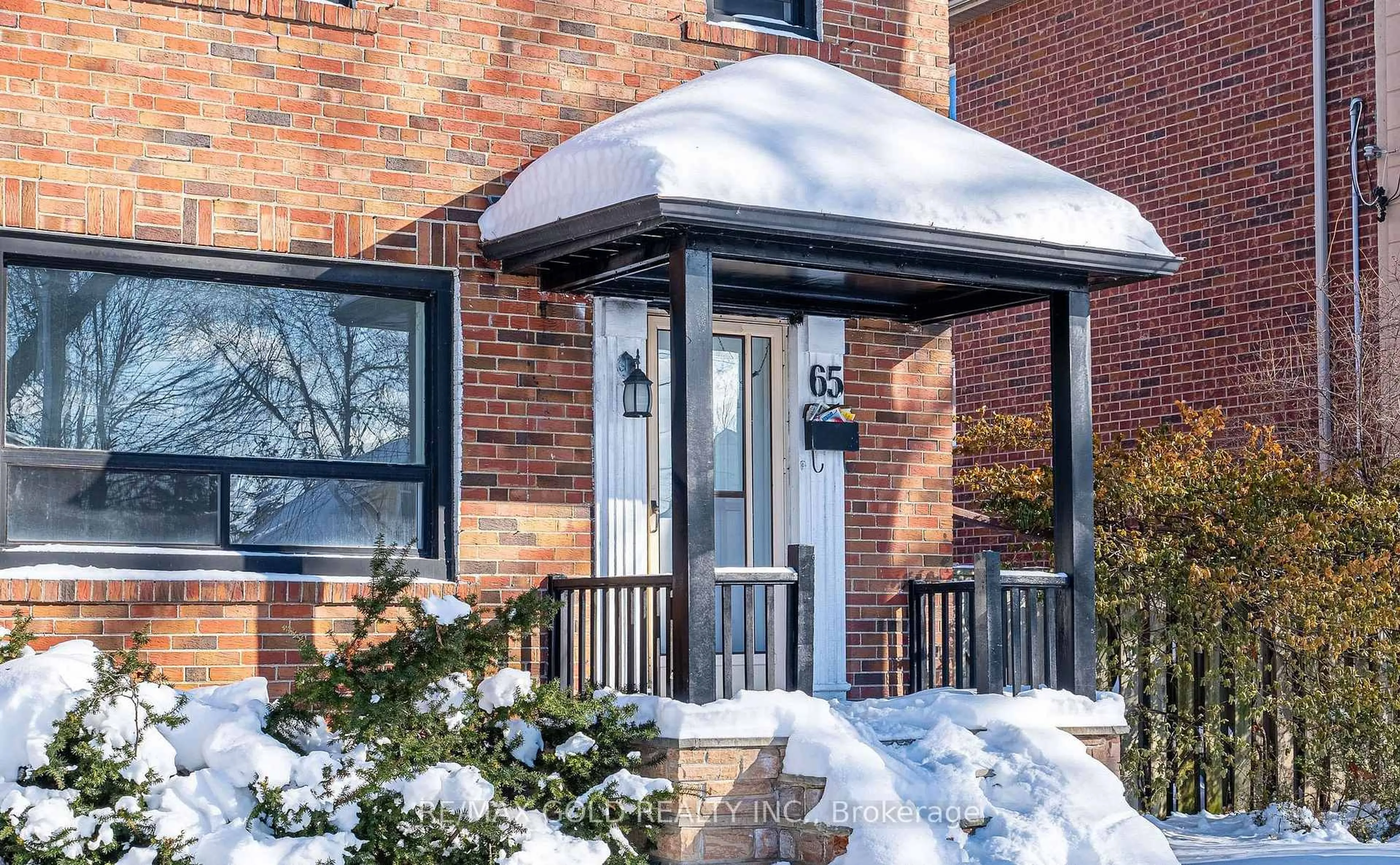 Home with brick exterior material, street for 65 Long Branch Ave, Toronto Ontario M8W 3J3