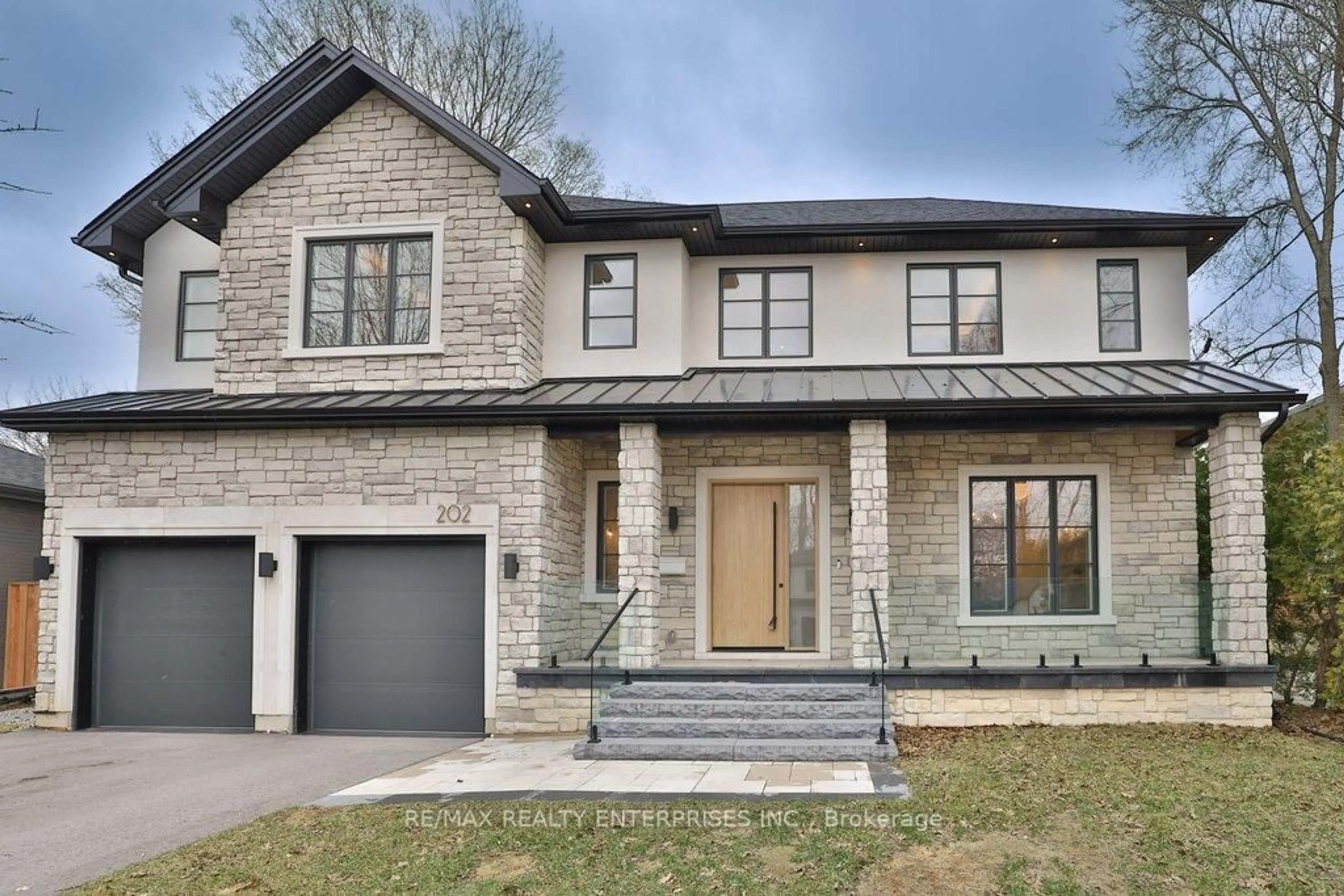 Home with brick exterior material, street for 202 Queen St, Mississauga Ontario L5H 1L6