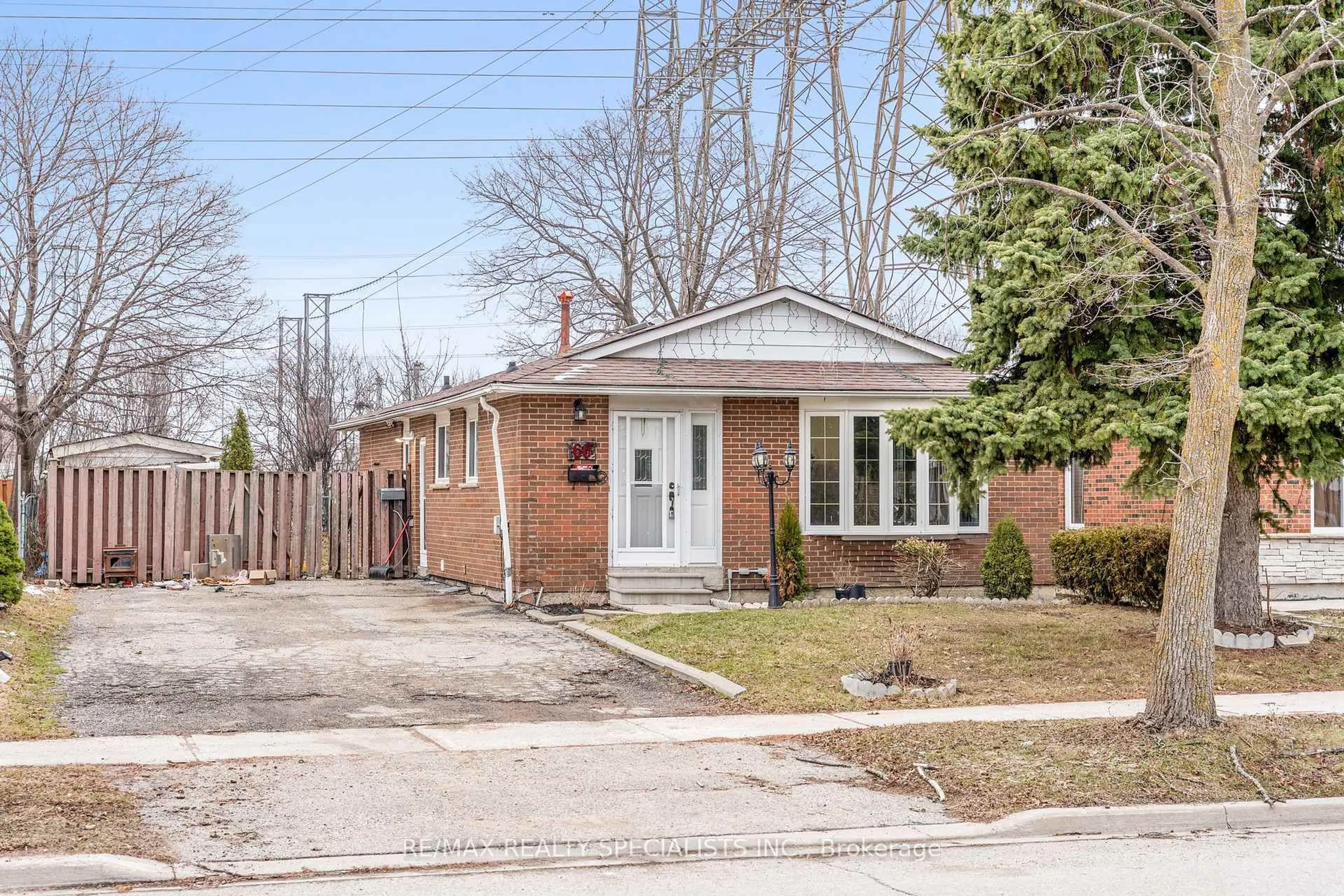 Home with brick exterior material, street for 66 Avening Dr, Toronto Ontario M9V 1Y1