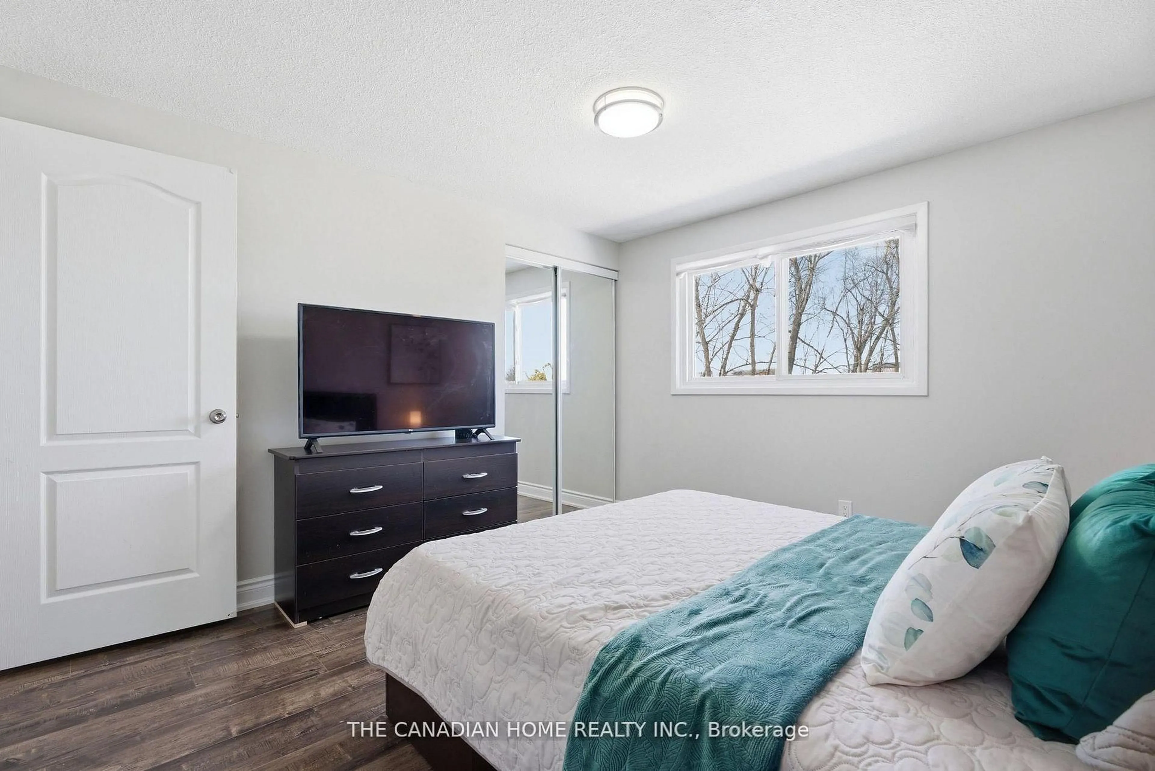 Bedroom with bed, wood/laminate floor for 22 Hindquarter Crt, Brampton Ontario L6S 2C3