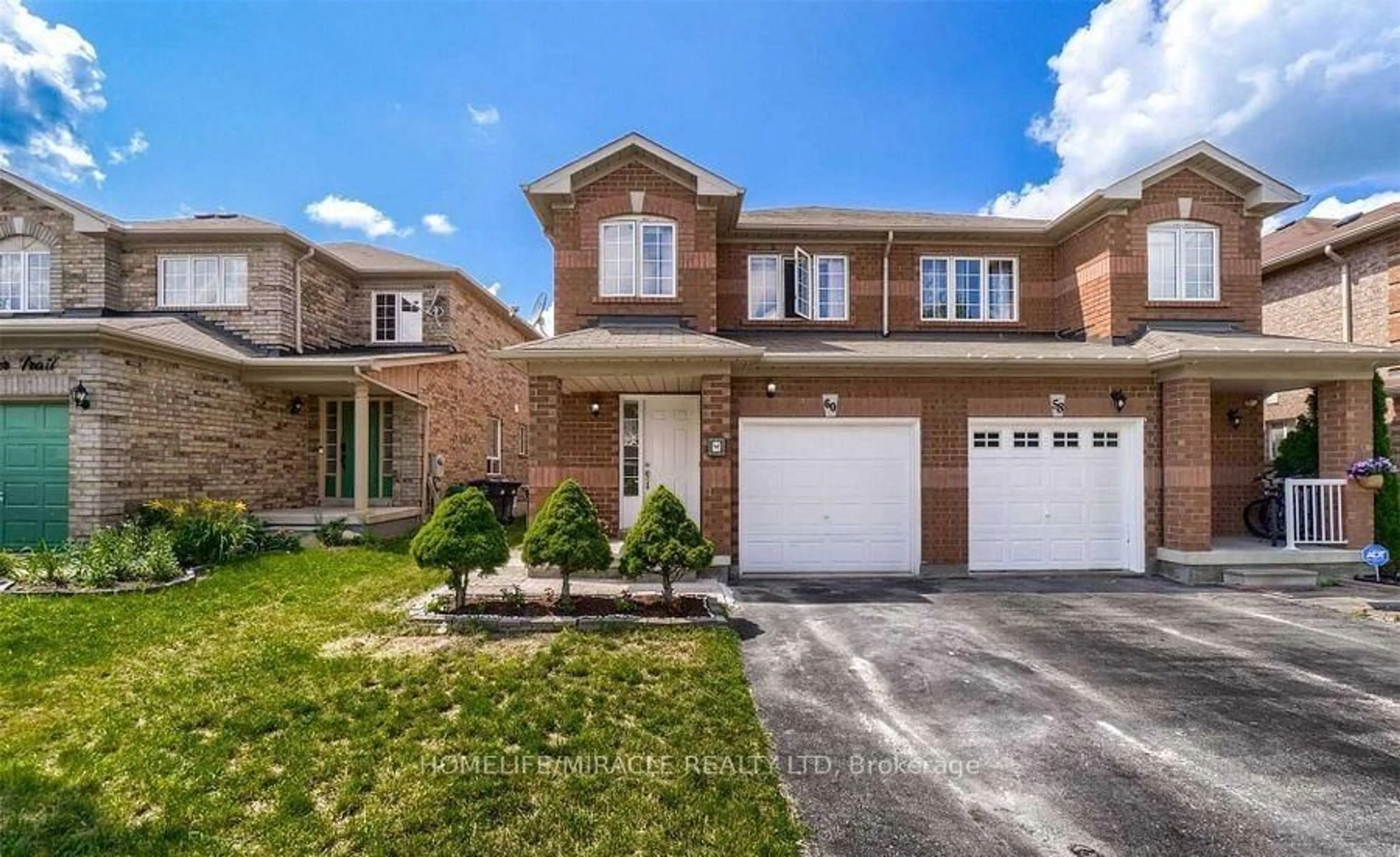 Home with brick exterior material, street for 60 Studebaker Tr, Brampton Ontario L7A 3A5
