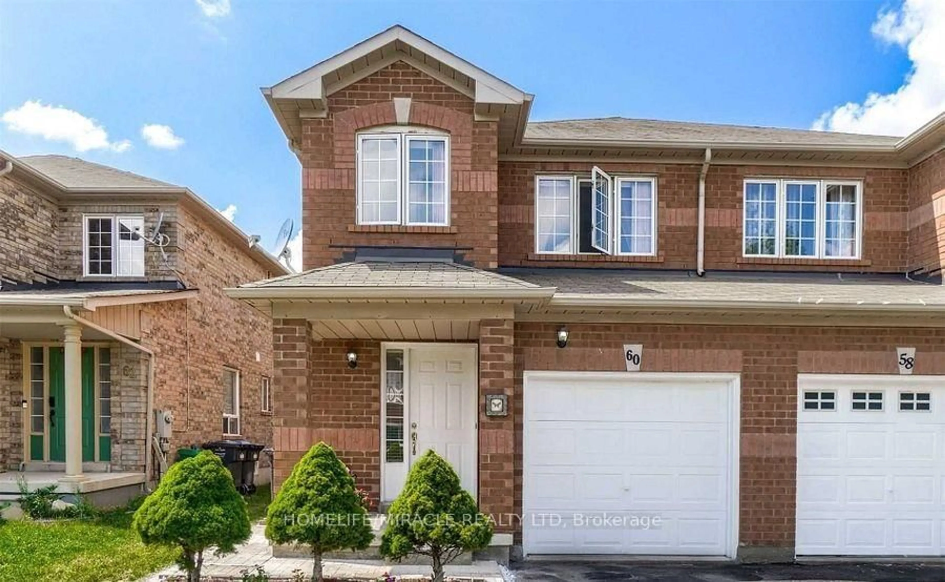 Home with brick exterior material, street for 60 Studebaker Tr, Brampton Ontario L7A 3A5