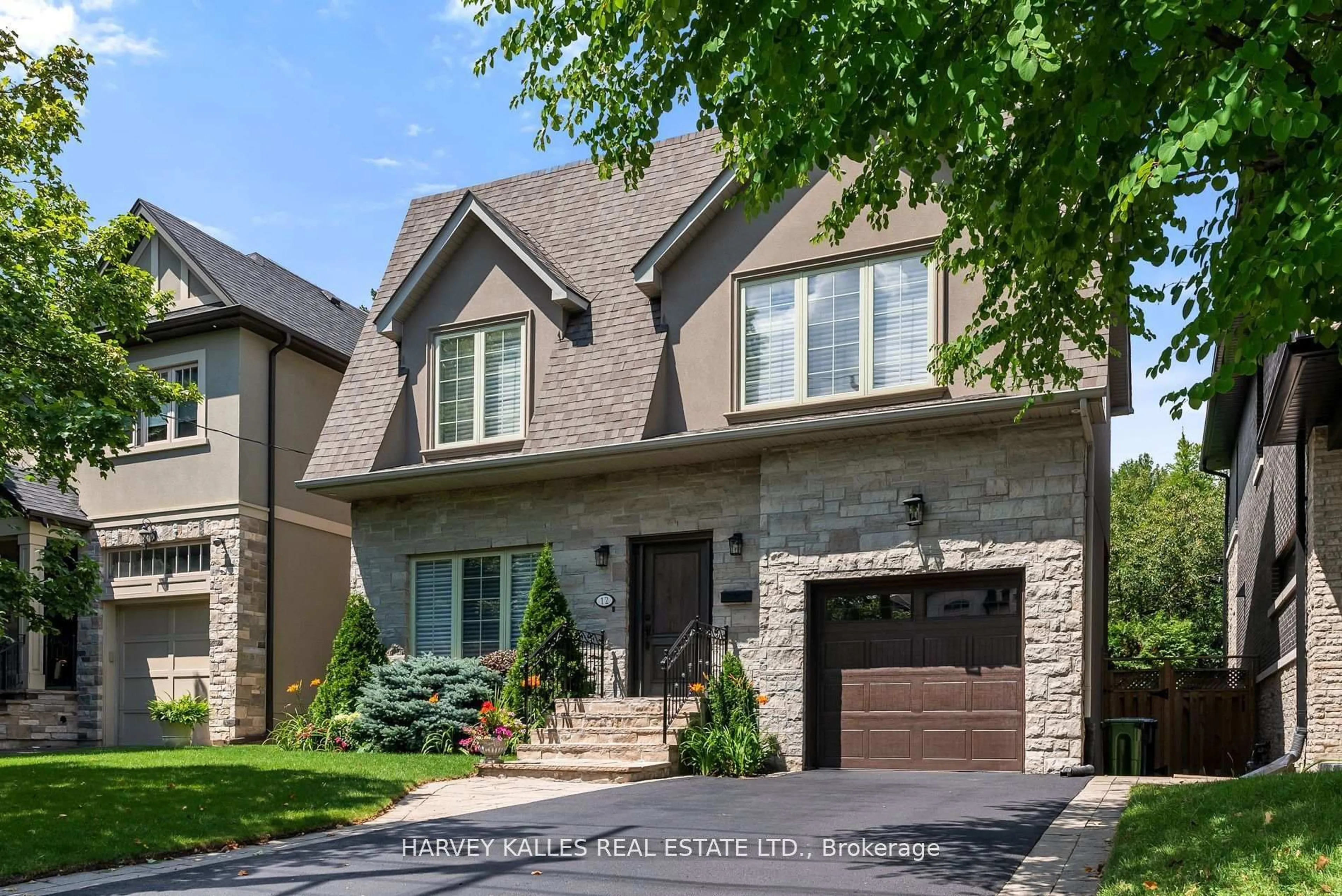 Home with brick exterior material, street for 12 Reid Manr, Toronto Ontario M8Y 2H7