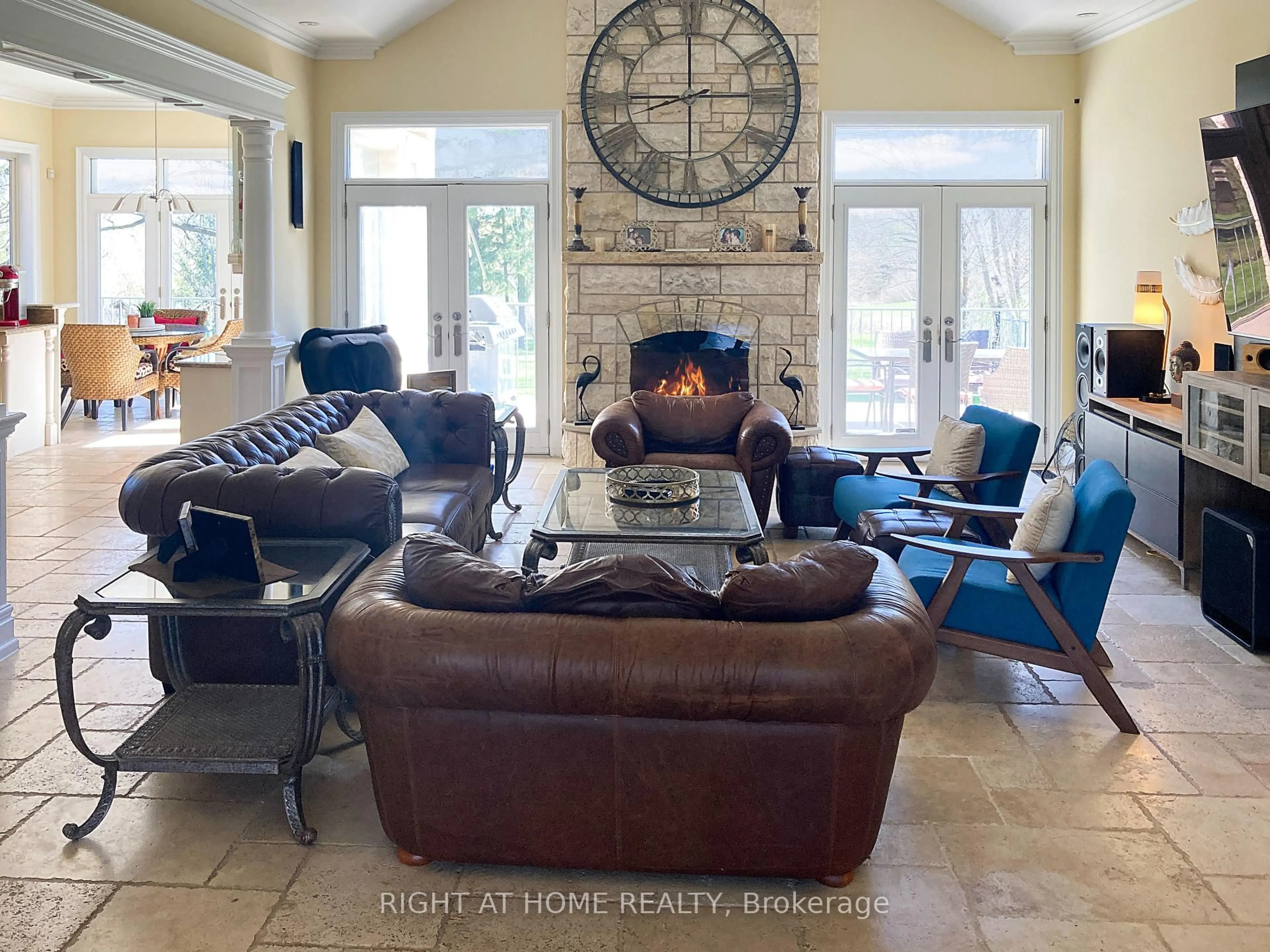 Living room with furniture, ceramic/tile floor for 16282 27 Side Rd, Halton Hills Ontario L0P 1N0