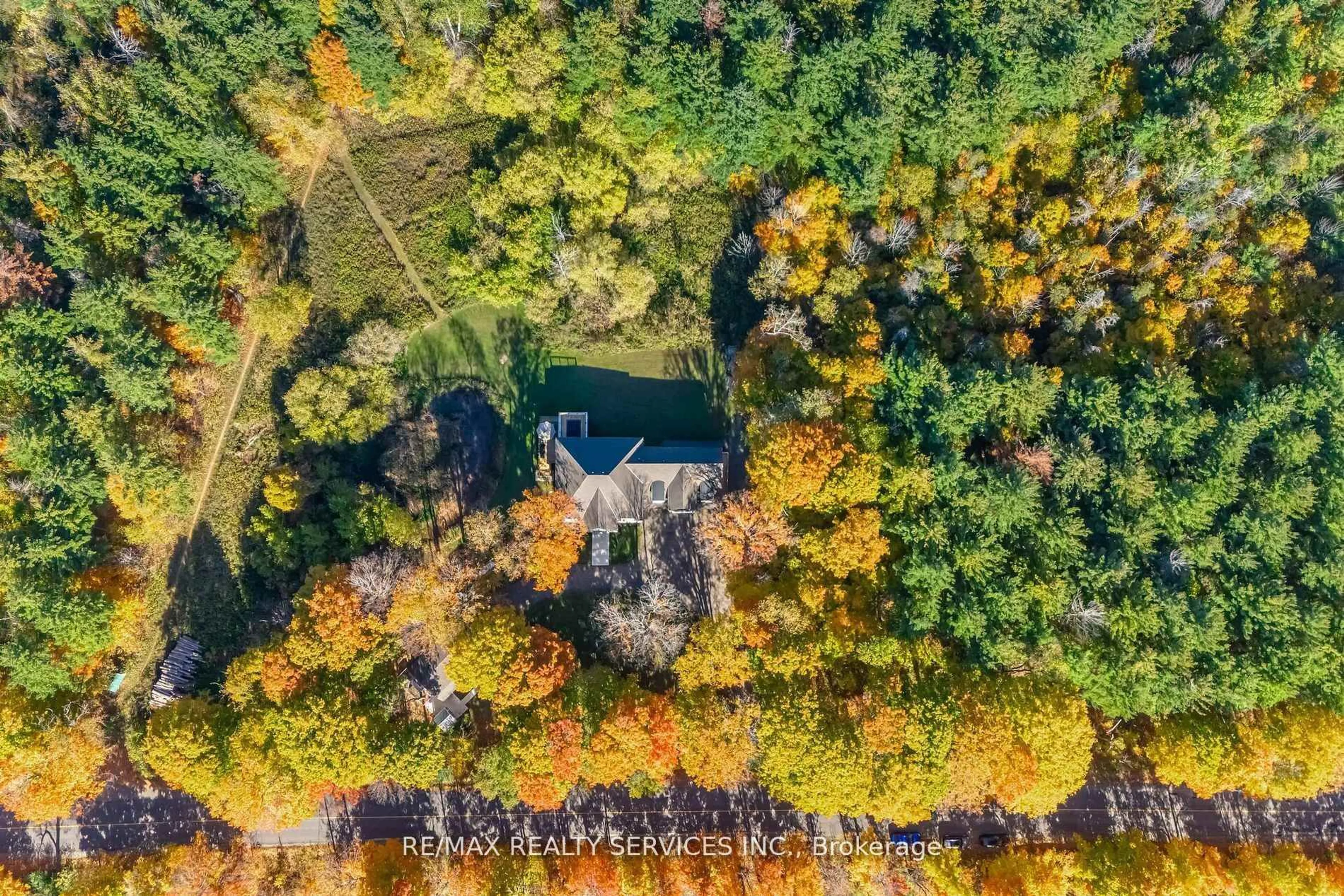 A pic from outside/outdoor area/front of a property/back of a property/a pic from drone, forest/trees view for 17711 Humber Station Rd, Caledon Ontario L7E 3A7