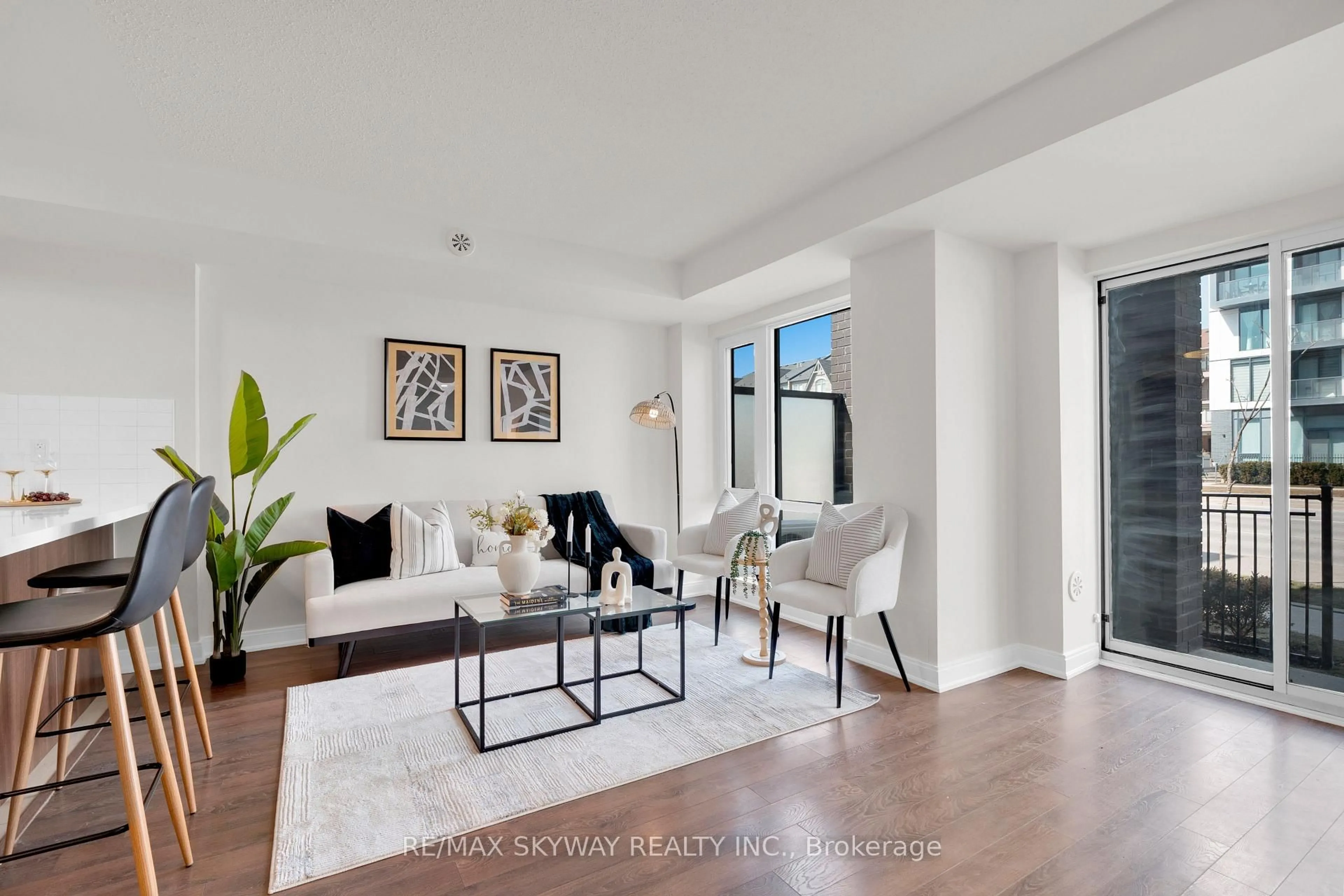 Living room with furniture, unknown for 100 Dufay Rd #85, Brampton Ontario L7A 4S3