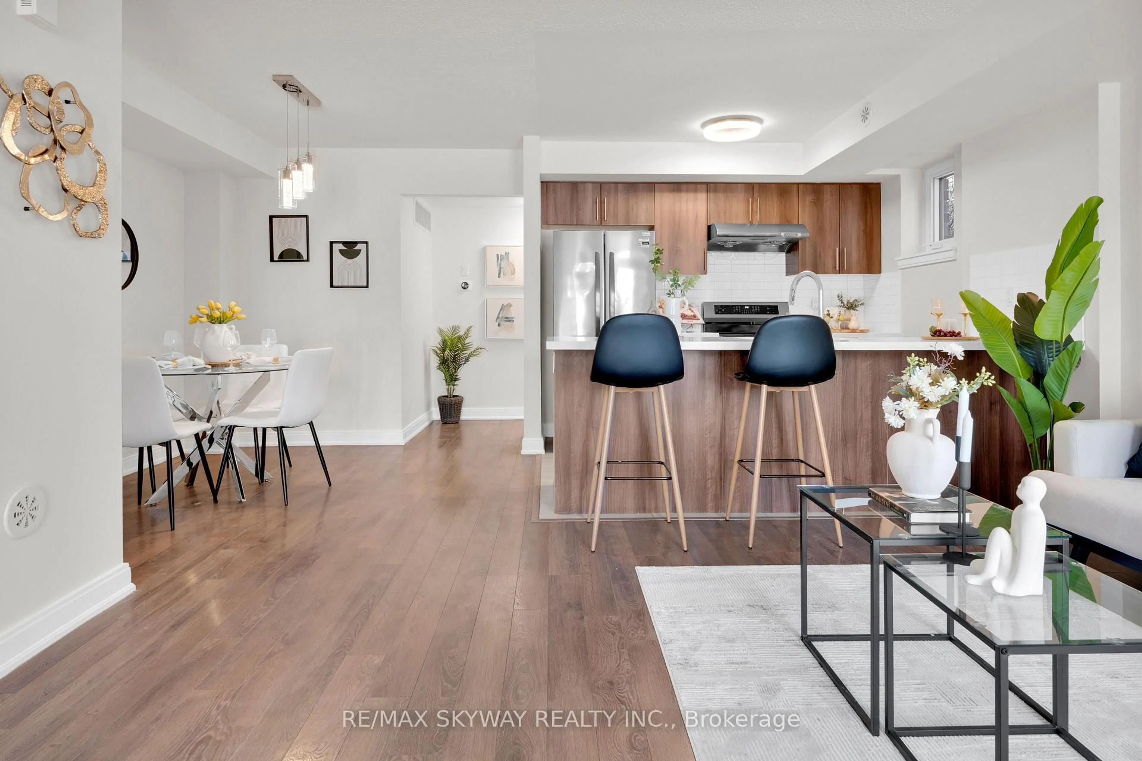 Open concept kitchen, wood/laminate floor for 100 Dufay Rd #85, Brampton Ontario L7A 4S3