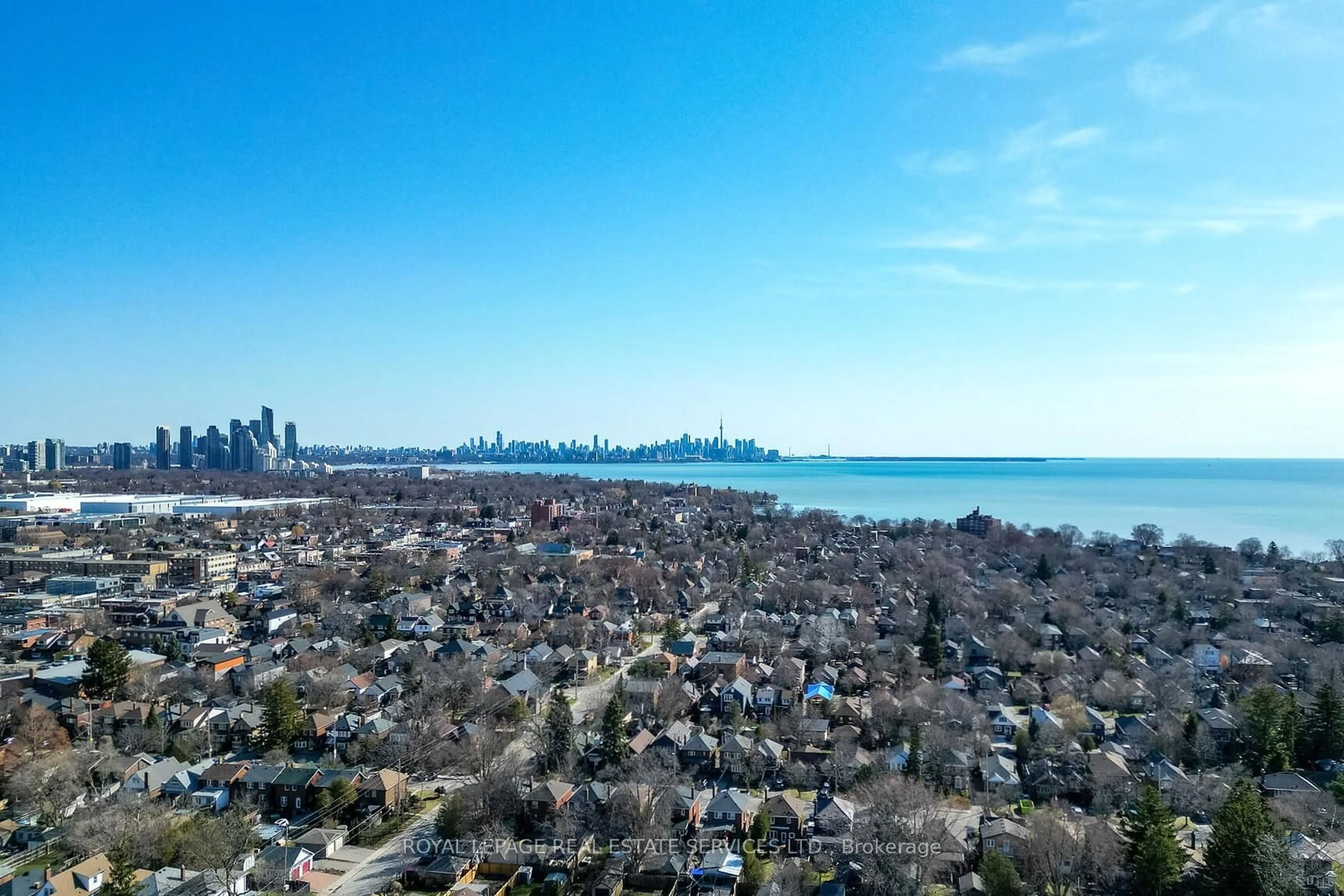 A pic from outside/outdoor area/front of a property/back of a property/a pic from drone, water/lake/river/ocean view for 99 Twelfth St, Toronto Ontario M8V 3G9