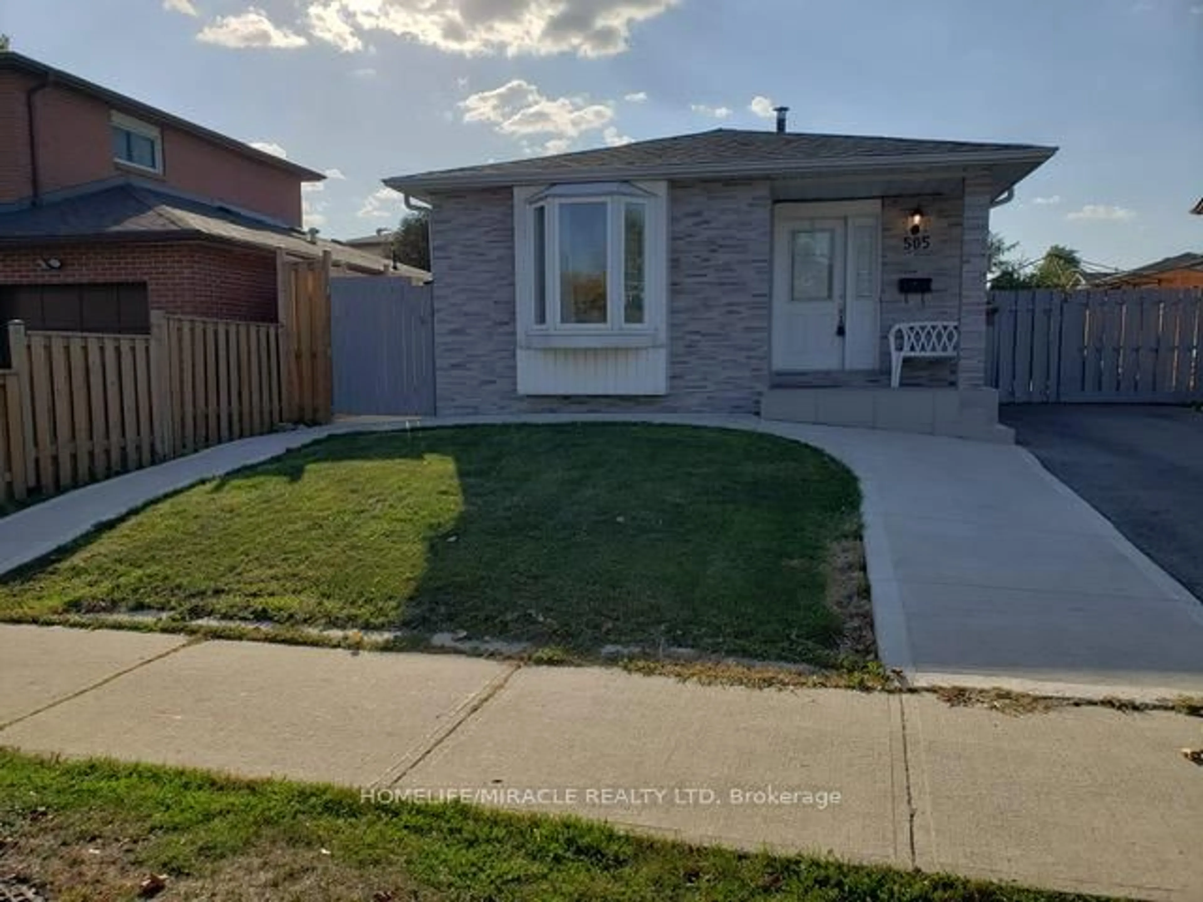 Home with brick exterior material, street for 505 SILVERSTONE Dr, Toronto Ontario M9V 4G8