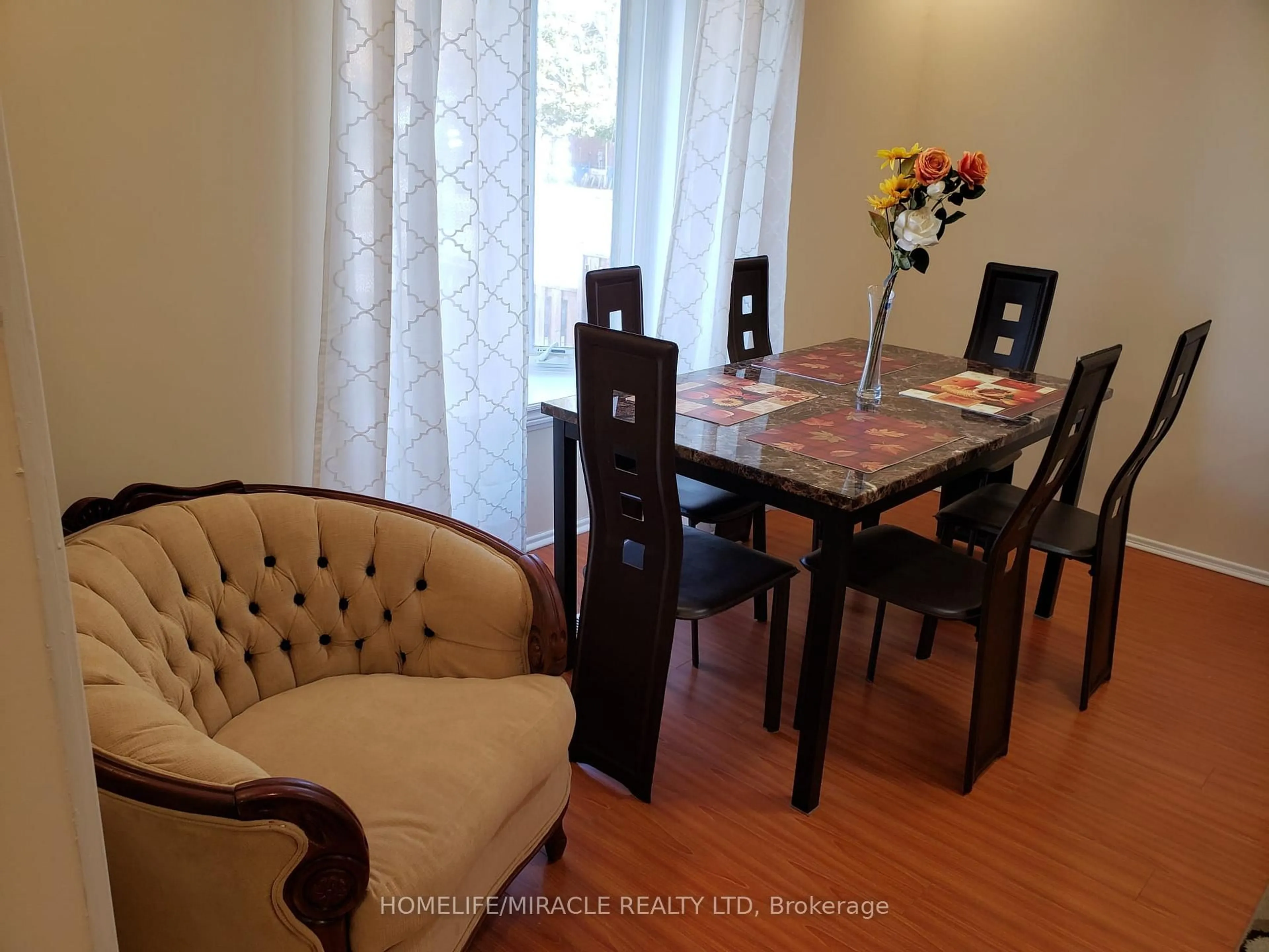 Dining room, wood/laminate floor for 505 SILVERSTONE Dr, Toronto Ontario M9V 4G8
