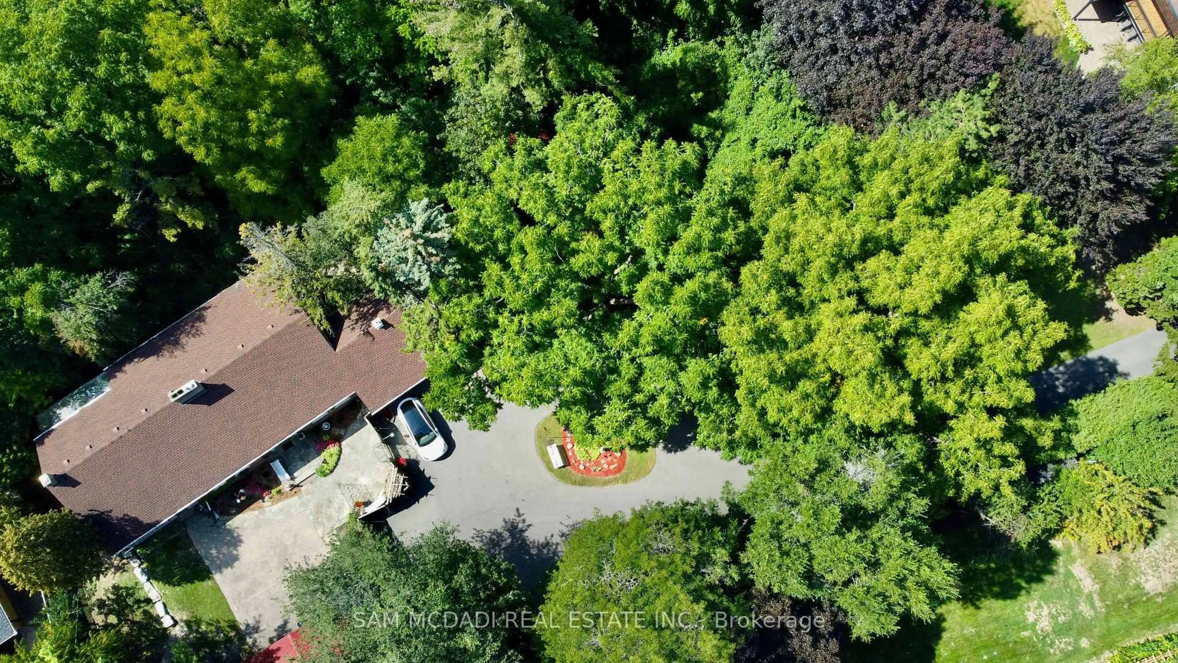 A pic from outside/outdoor area/front of a property/back of a property/a pic from drone, forest/trees view for 85 Yorkleigh Ave, Toronto Ontario M9P 1Y3