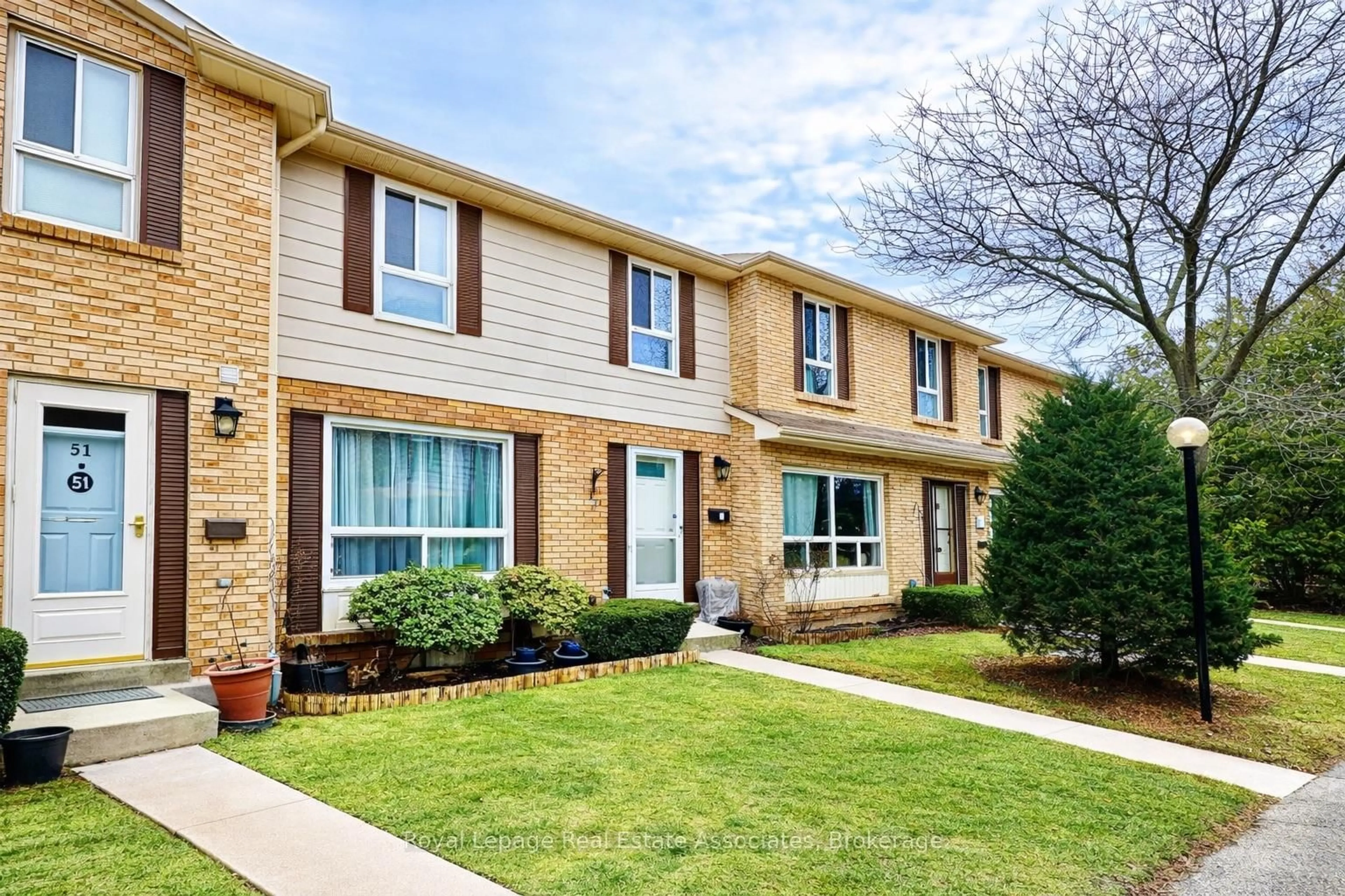 Home with brick exterior material, street for 5475 Lakeshore Rd #51, Burlington Ontario L7L 1E1