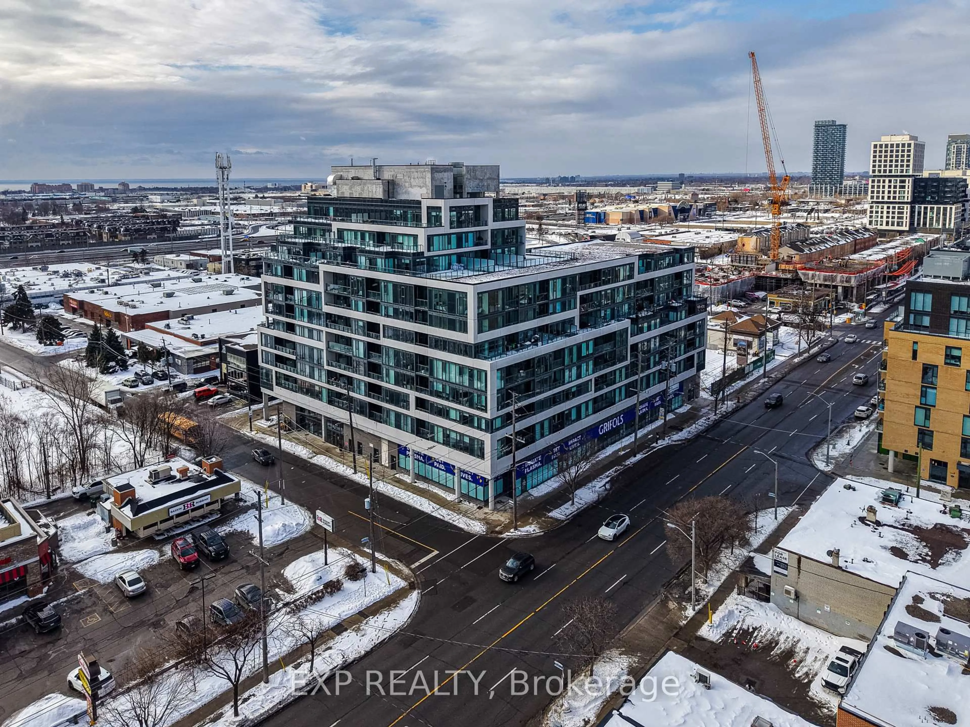 A pic from outside/outdoor area/front of a property/back of a property/a pic from drone, city buildings view from balcony for 859 The Queensway #209, Toronto Ontario M8Z 1N8