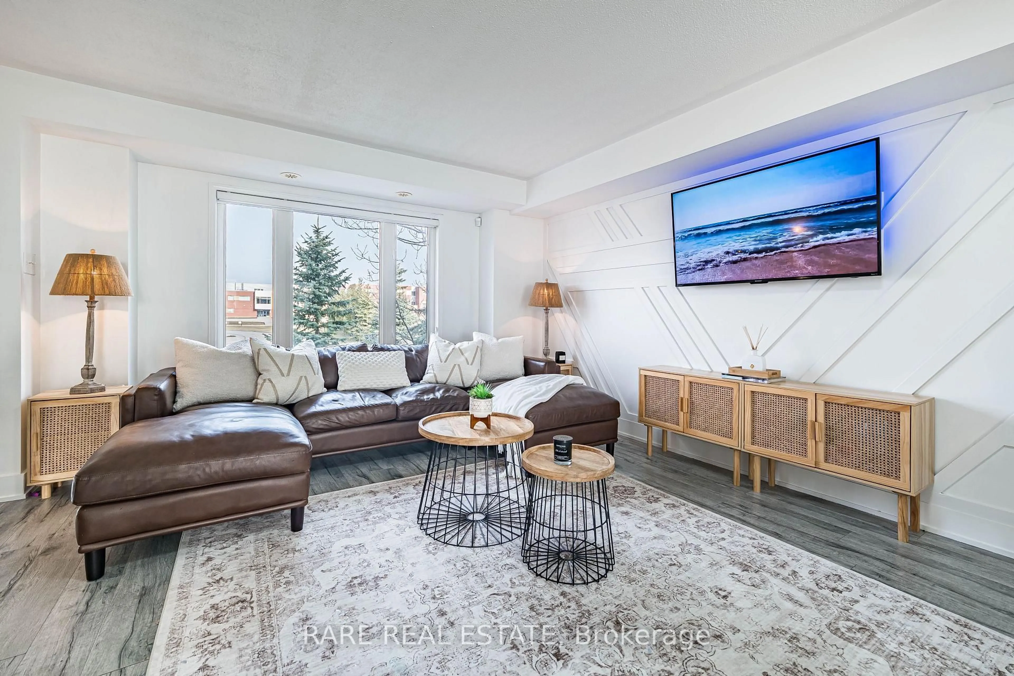 Living room with furniture, unknown for 60 Fairwood Circ #28, Brampton Ontario L6R 0Y6