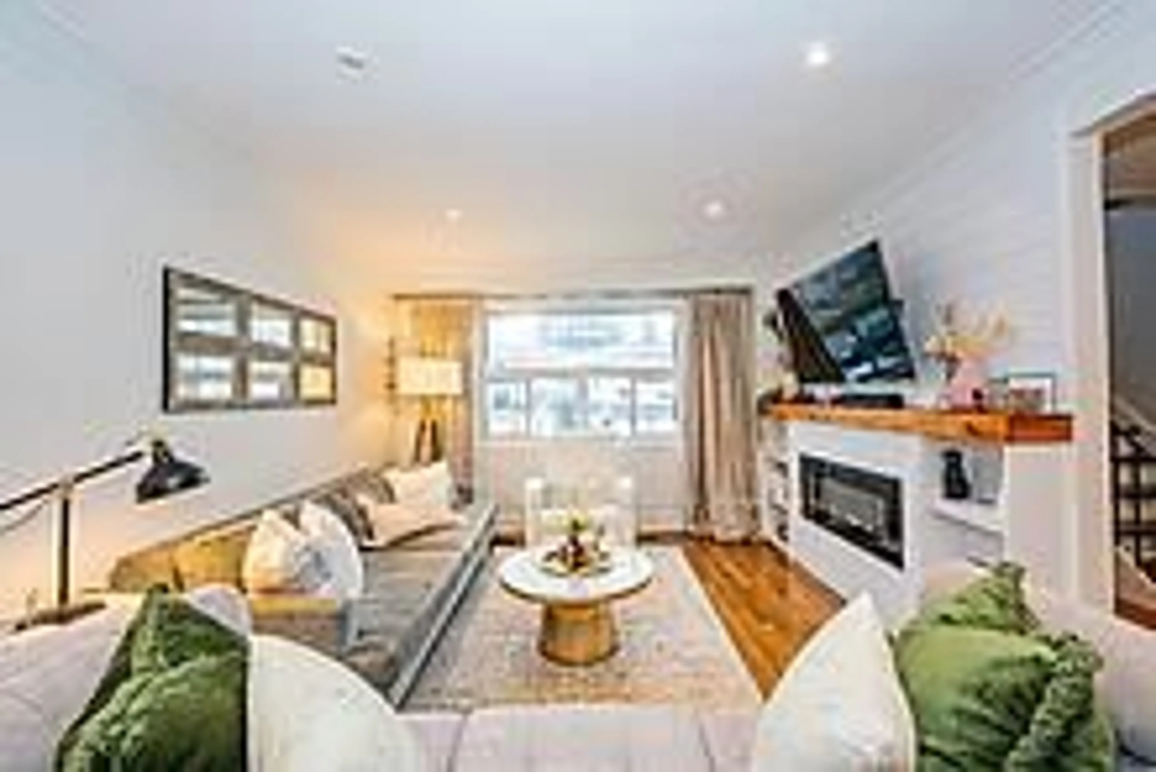 Living room with furniture, wood/laminate floor for 1050 Shawnmarr Rd #145, Mississauga Ontario L5H 3V1