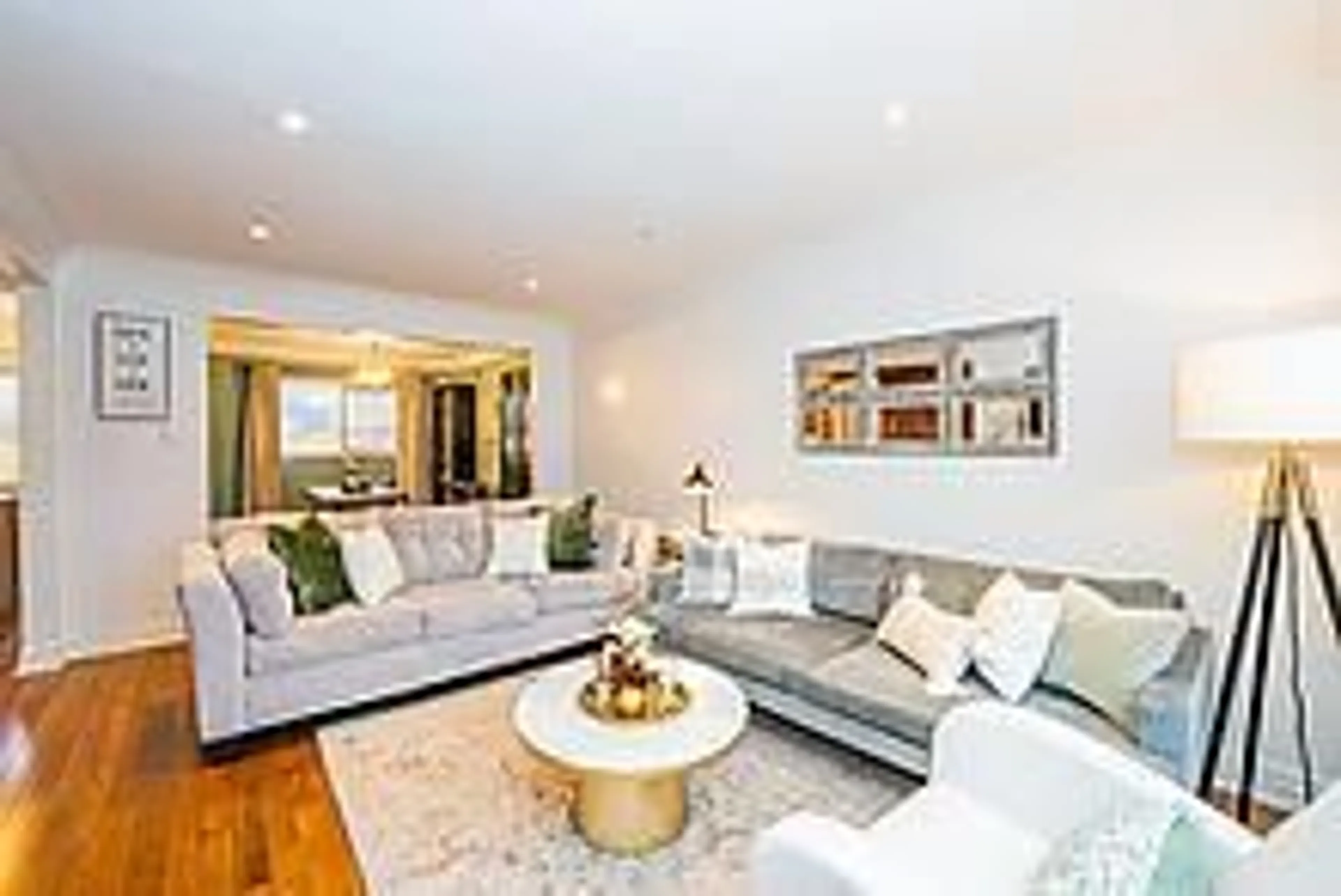 Living room with furniture, wood/laminate floor for 1050 Shawnmarr Rd #145, Mississauga Ontario L5H 3V1