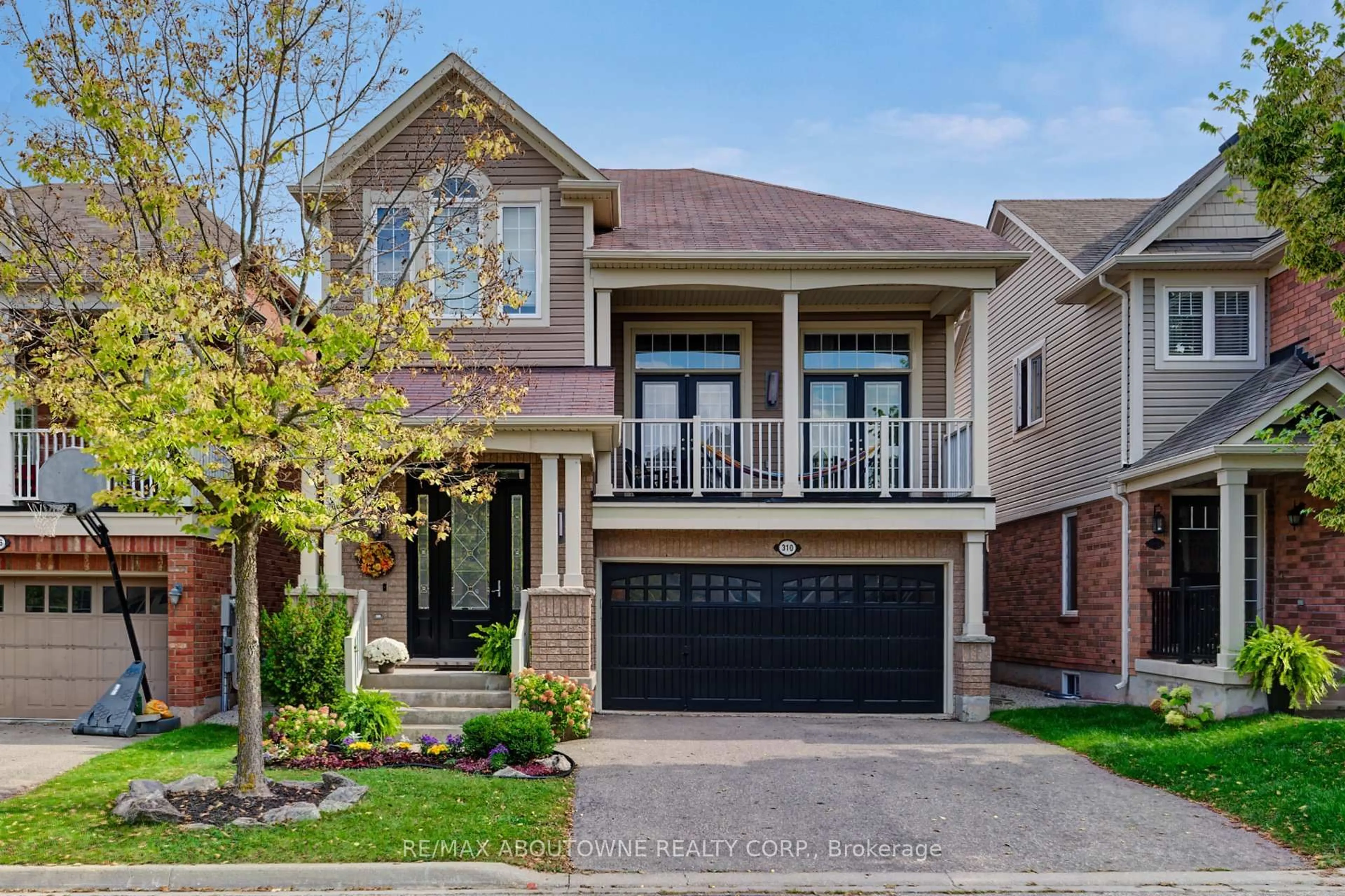 Home with brick exterior material, street for 310 Leitch Landing, Milton Ontario L9T 7M9