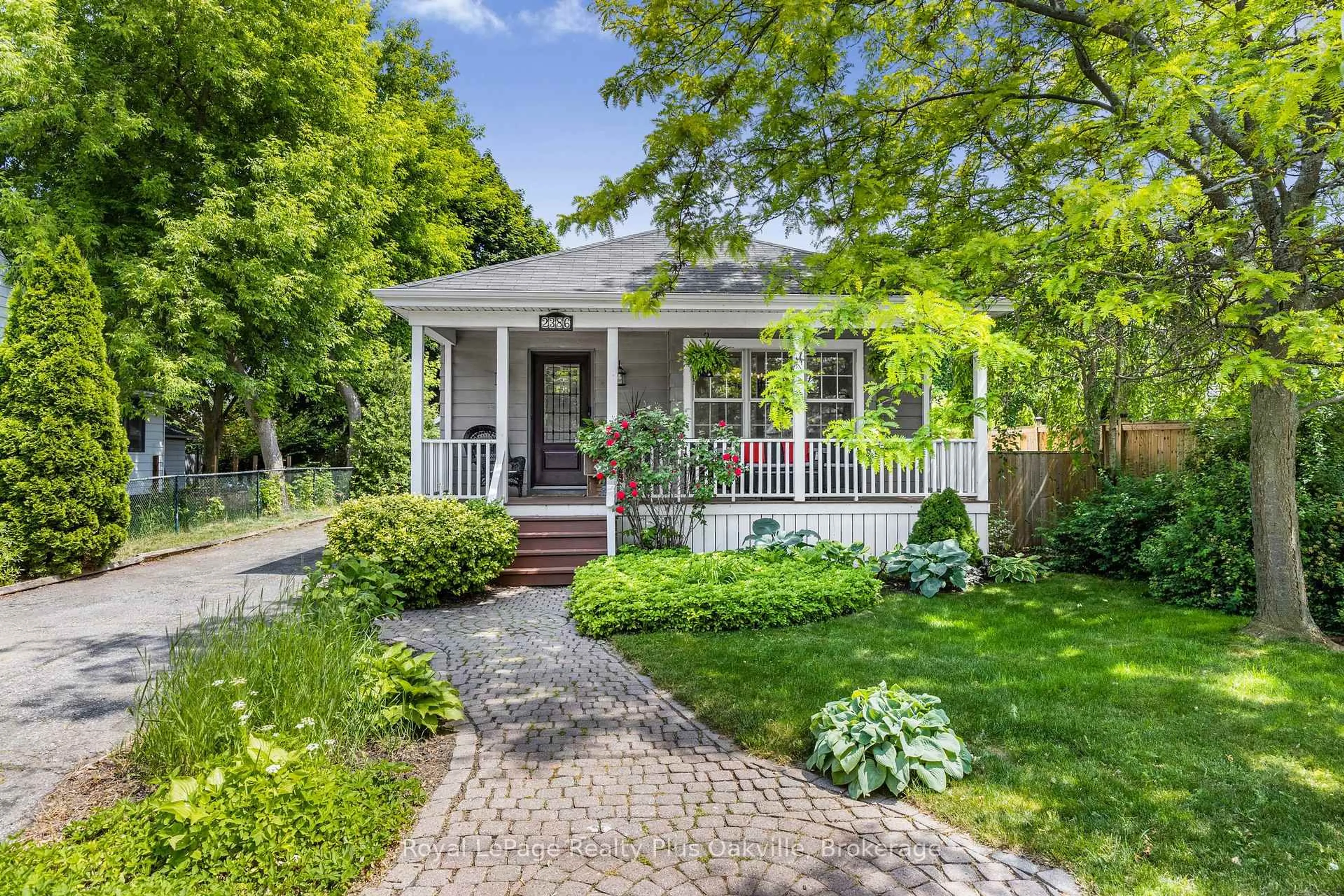 Home with brick exterior material, street for 2386 Rebecca St, Oakville Ontario L6L 2A9