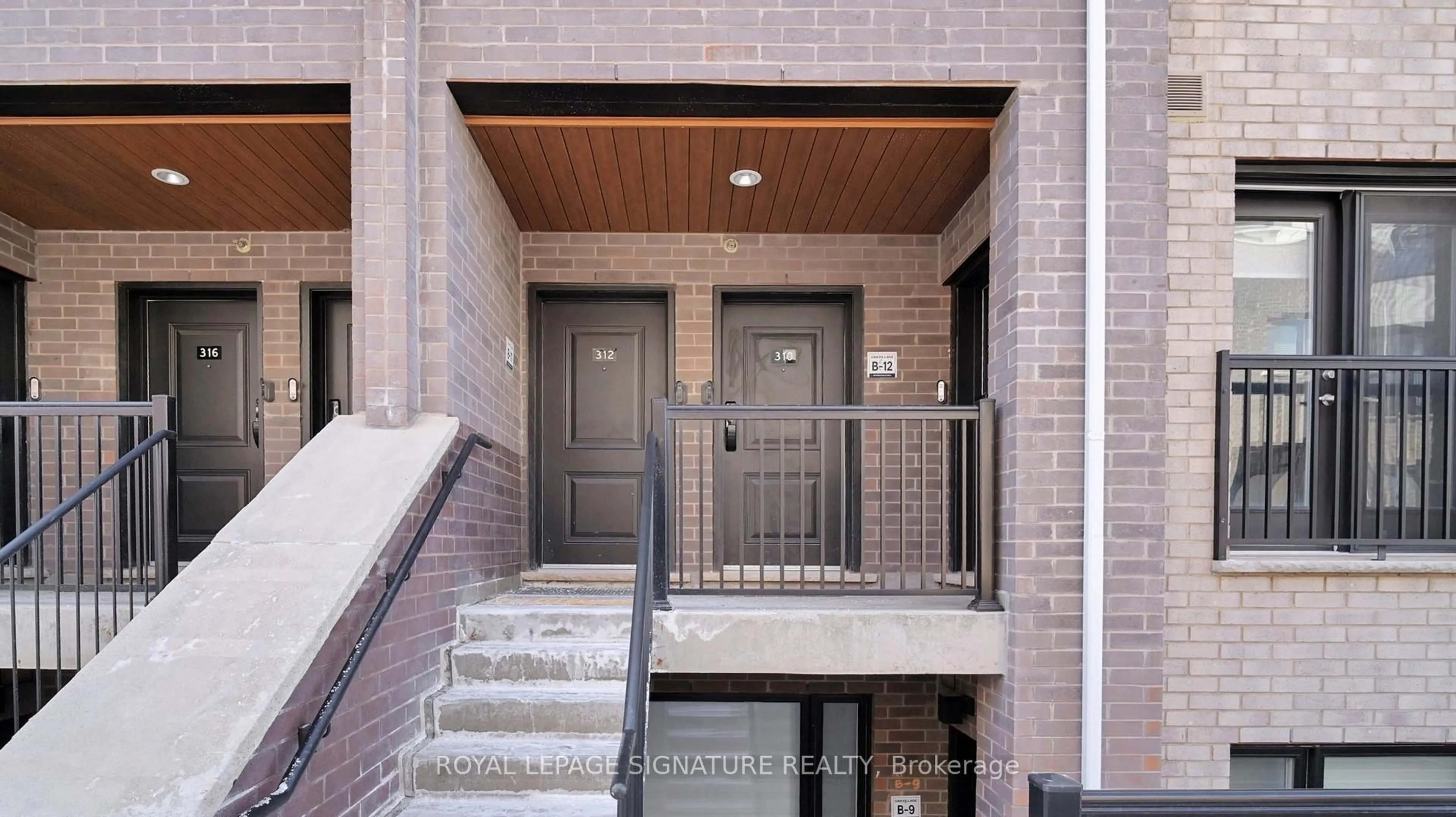 Home with brick exterior material, street for 349 Wheat Boom Dr #310, Oakville Ontario L6H 7X5