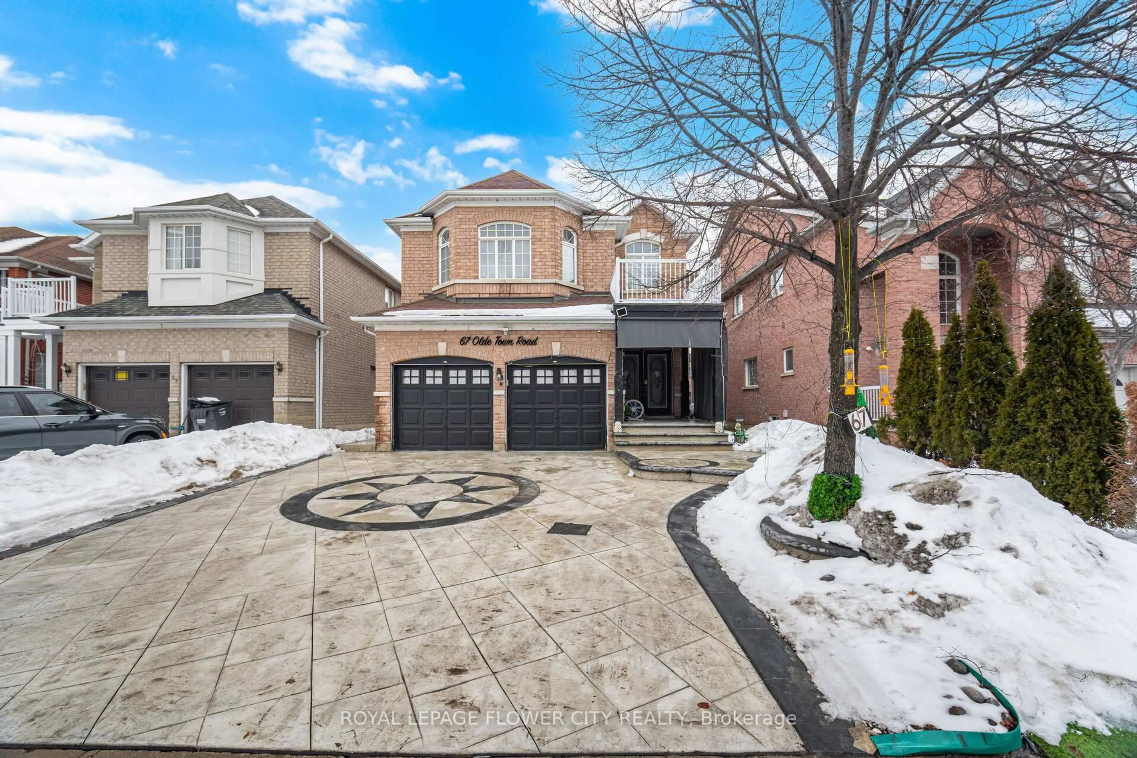Home with brick exterior material, street for 67 Olde Town Rd, Brampton Ontario L6X 4T8