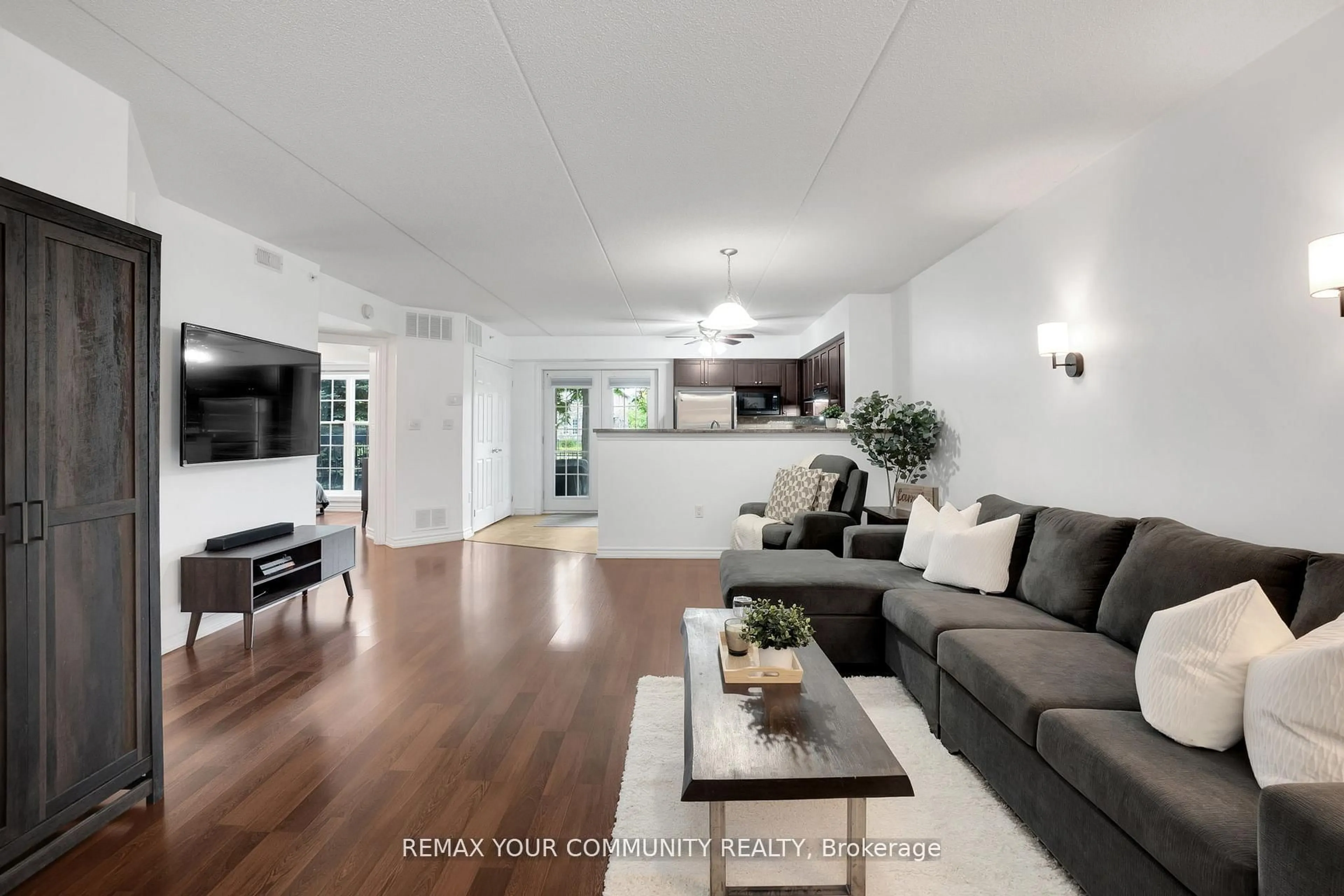 Living room with furniture, unknown for 1360 Main St #101, Milton Ontario L9T 7S5