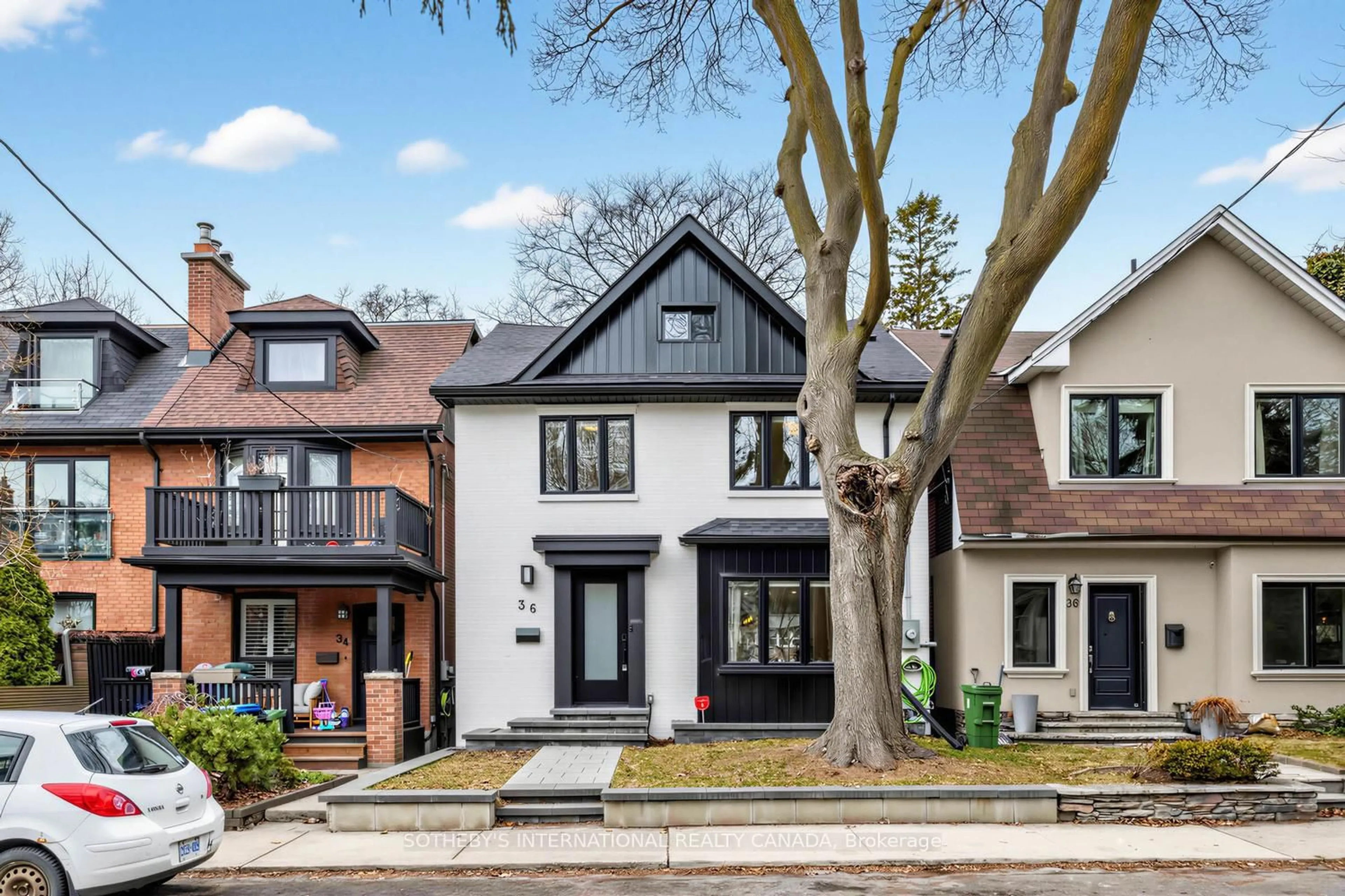 Home with brick exterior material, street for 36 Ridley Gdns, Toronto Ontario M6R 2T8