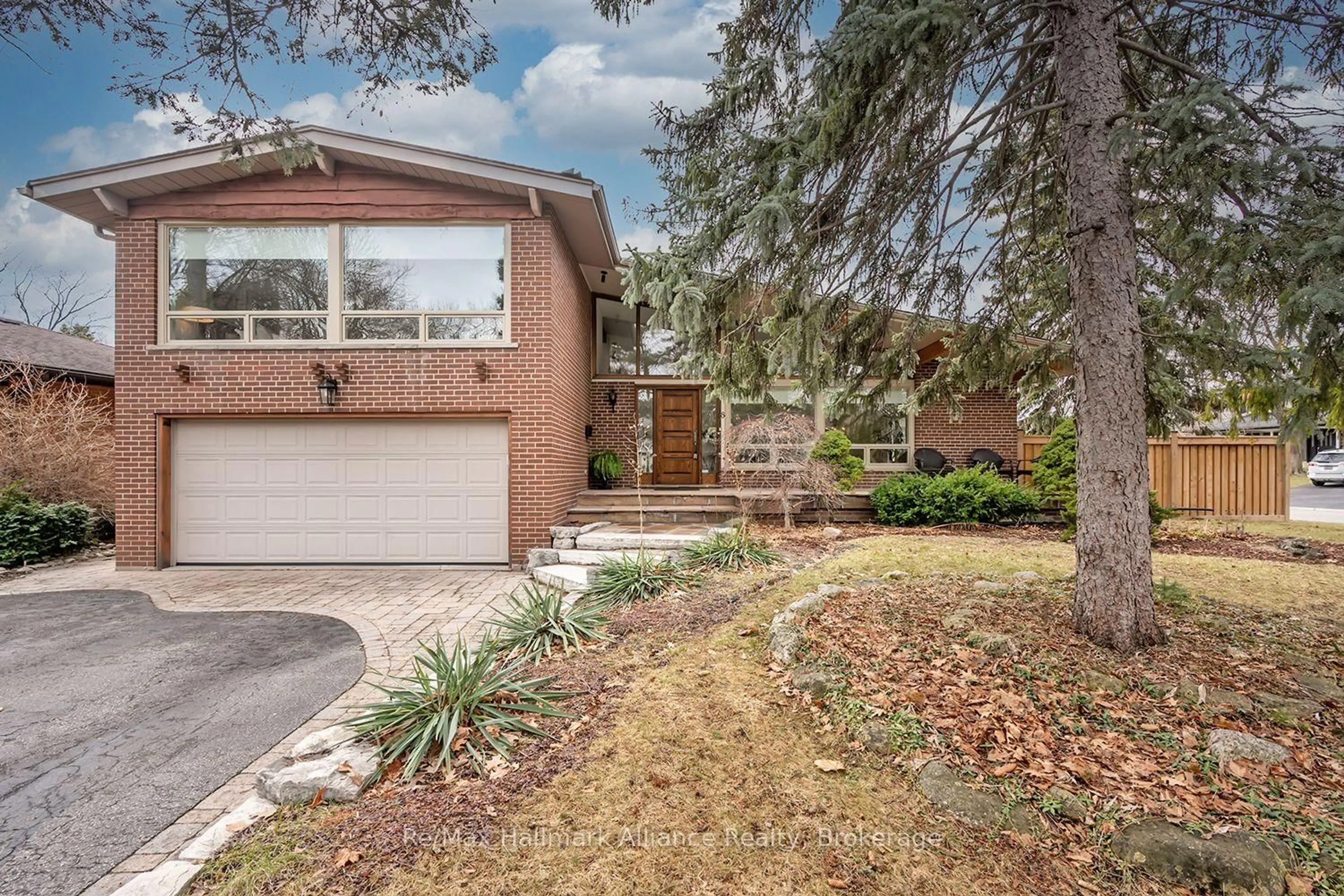 Home with brick exterior material, street for 8 Silverthorne Bush Dr, Toronto Ontario M9C 2X5