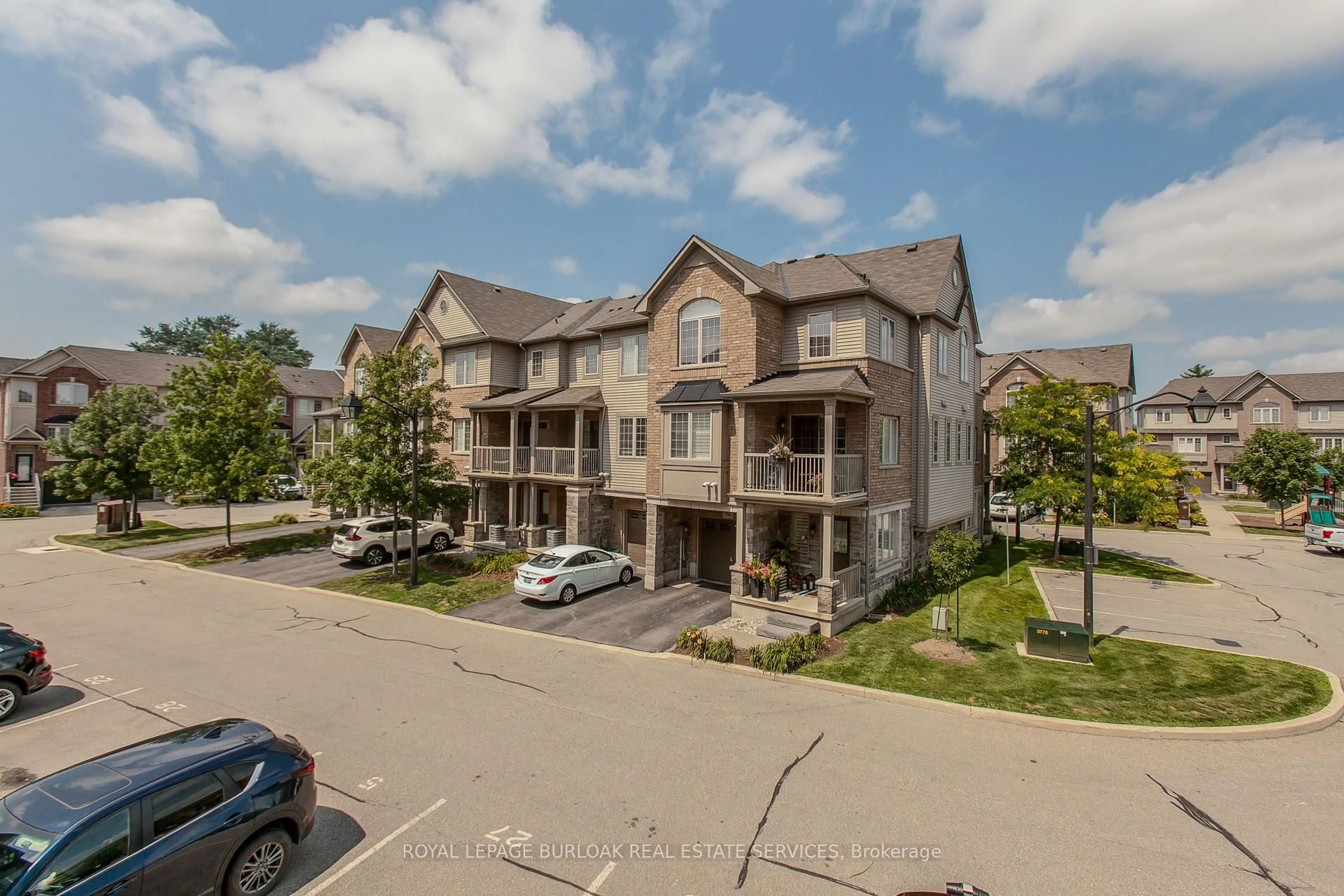 A pic from outside/outdoor area/front of a property/back of a property/a pic from drone, unknown for 1401 Plains Rd #26, Burlington Ontario L7R 0C2