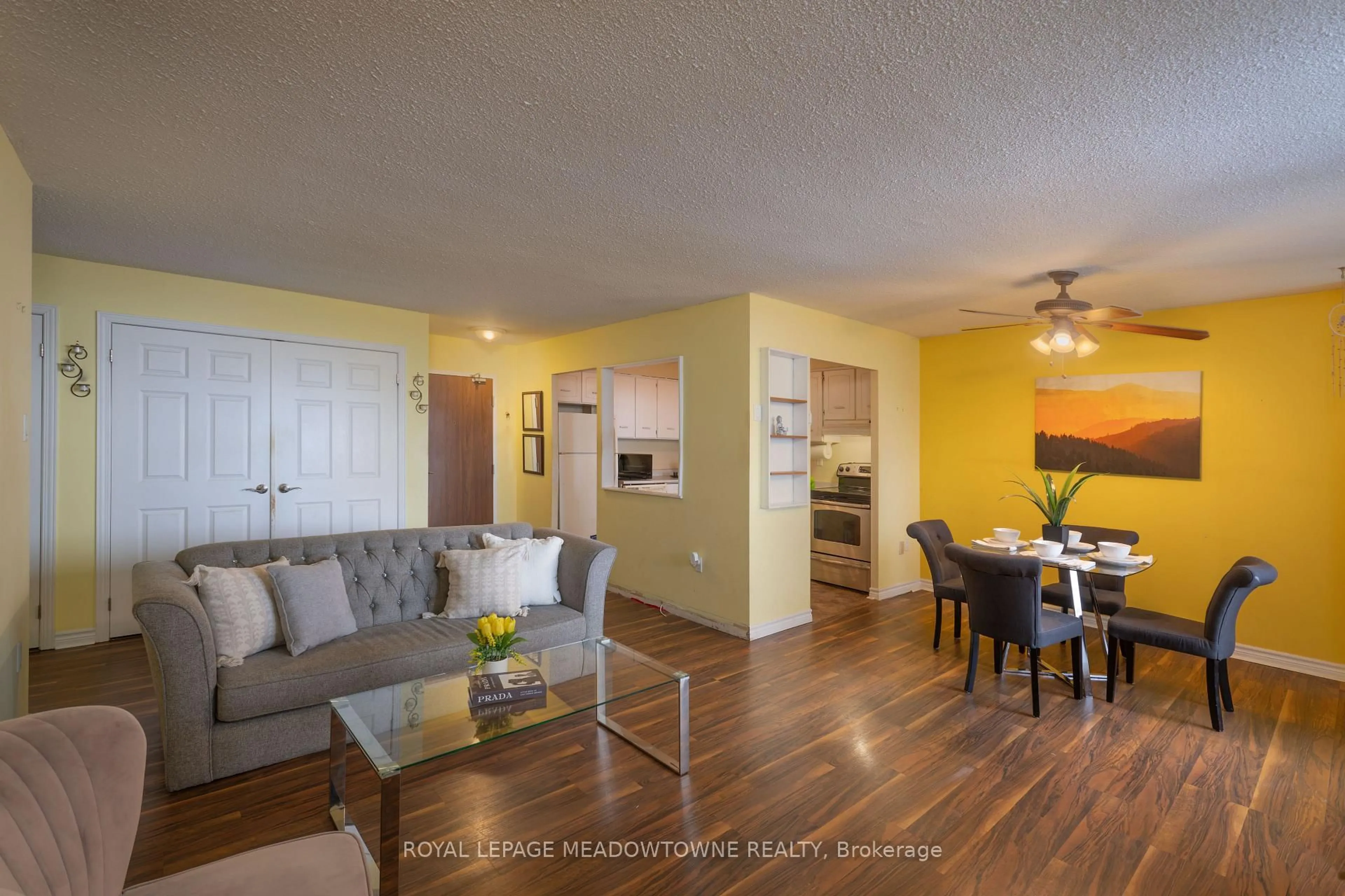 Living room with furniture, wood/laminate floor for 2301 Derry Rd ##806, Mississauga Ontario L5N 2R4