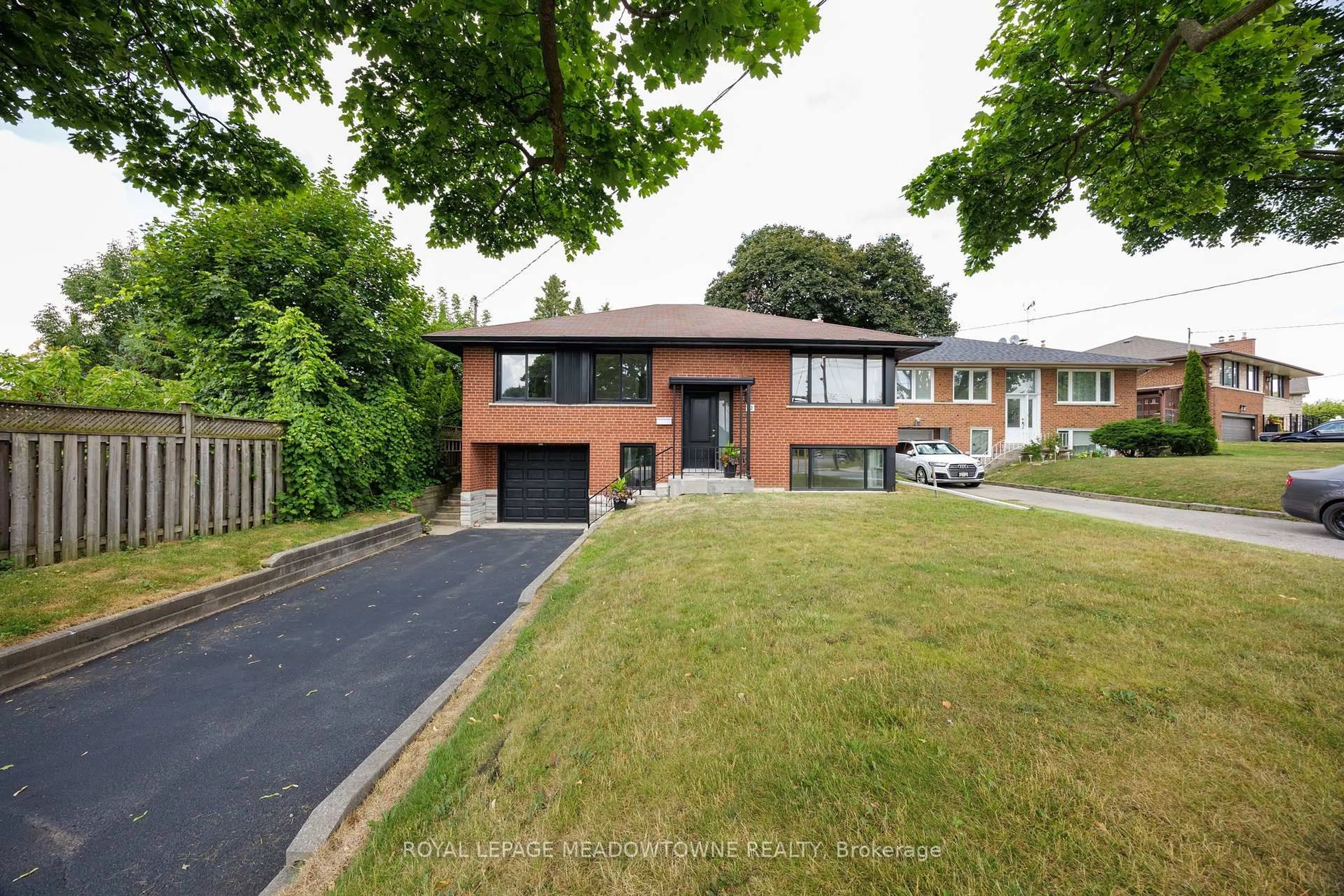 Home with brick exterior material, street for 92 The Westway, Toronto Ontario M9P 2B2