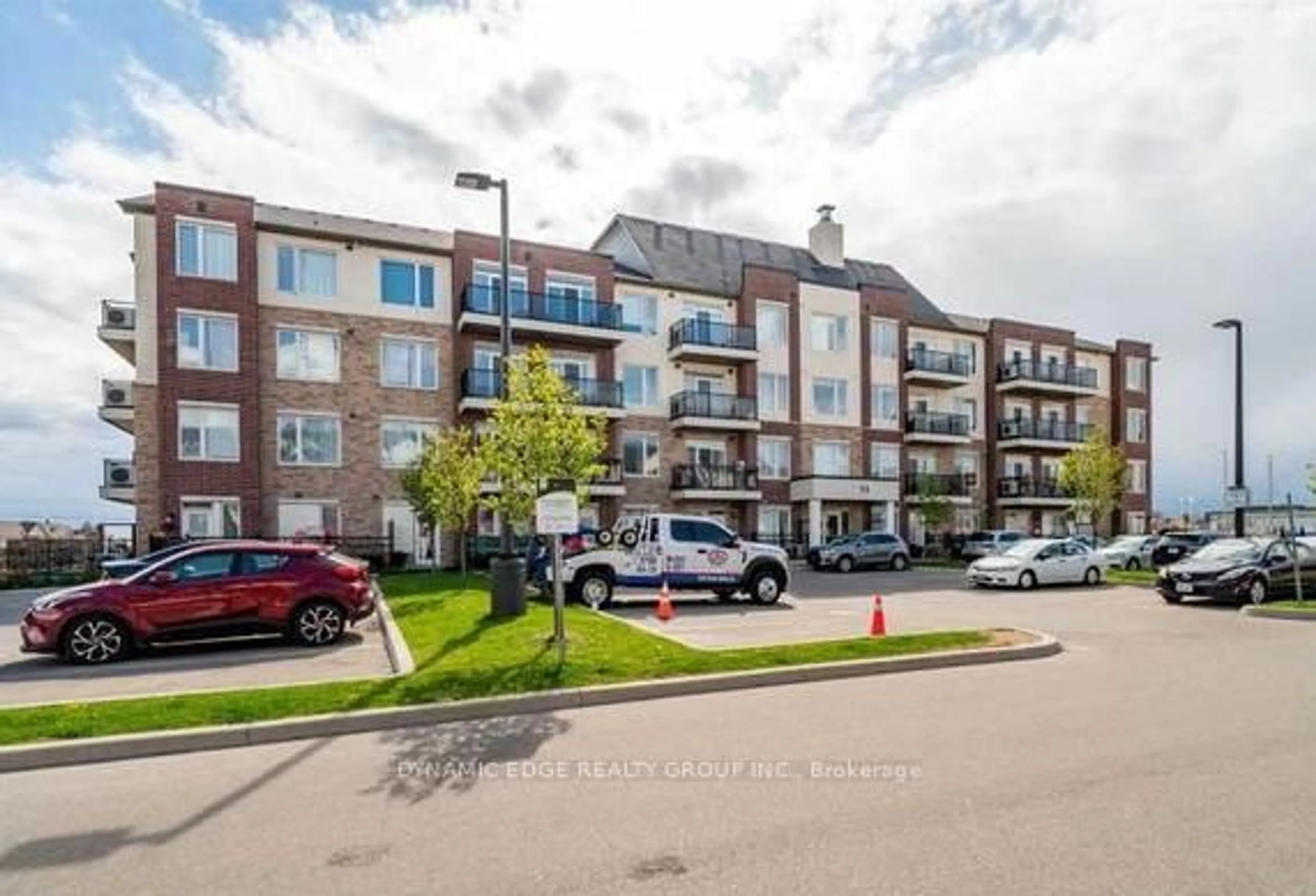 A pic from outside/outdoor area/front of a property/back of a property/a pic from drone, street for 54 Sky Harbour Dr #306, Brampton Ontario L6Y 6B9