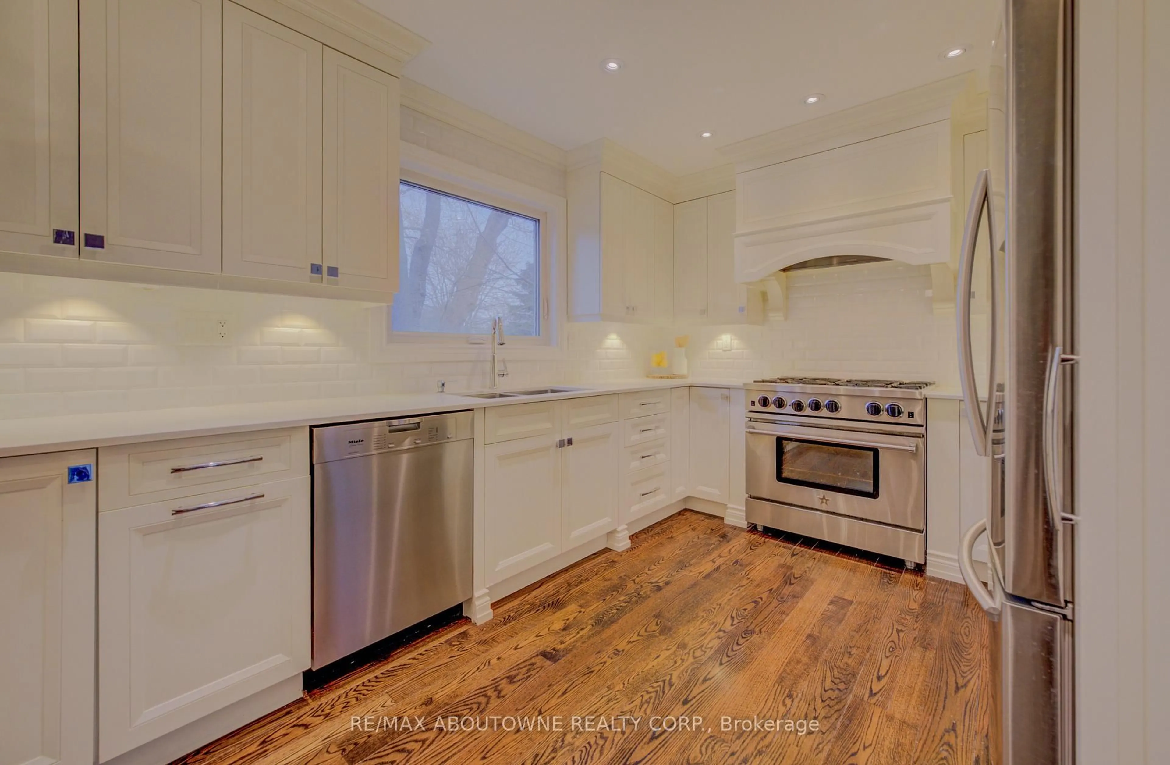 Open concept kitchen, unknown for 20 Martin Grove Rd, Toronto Ontario M9B 4J9