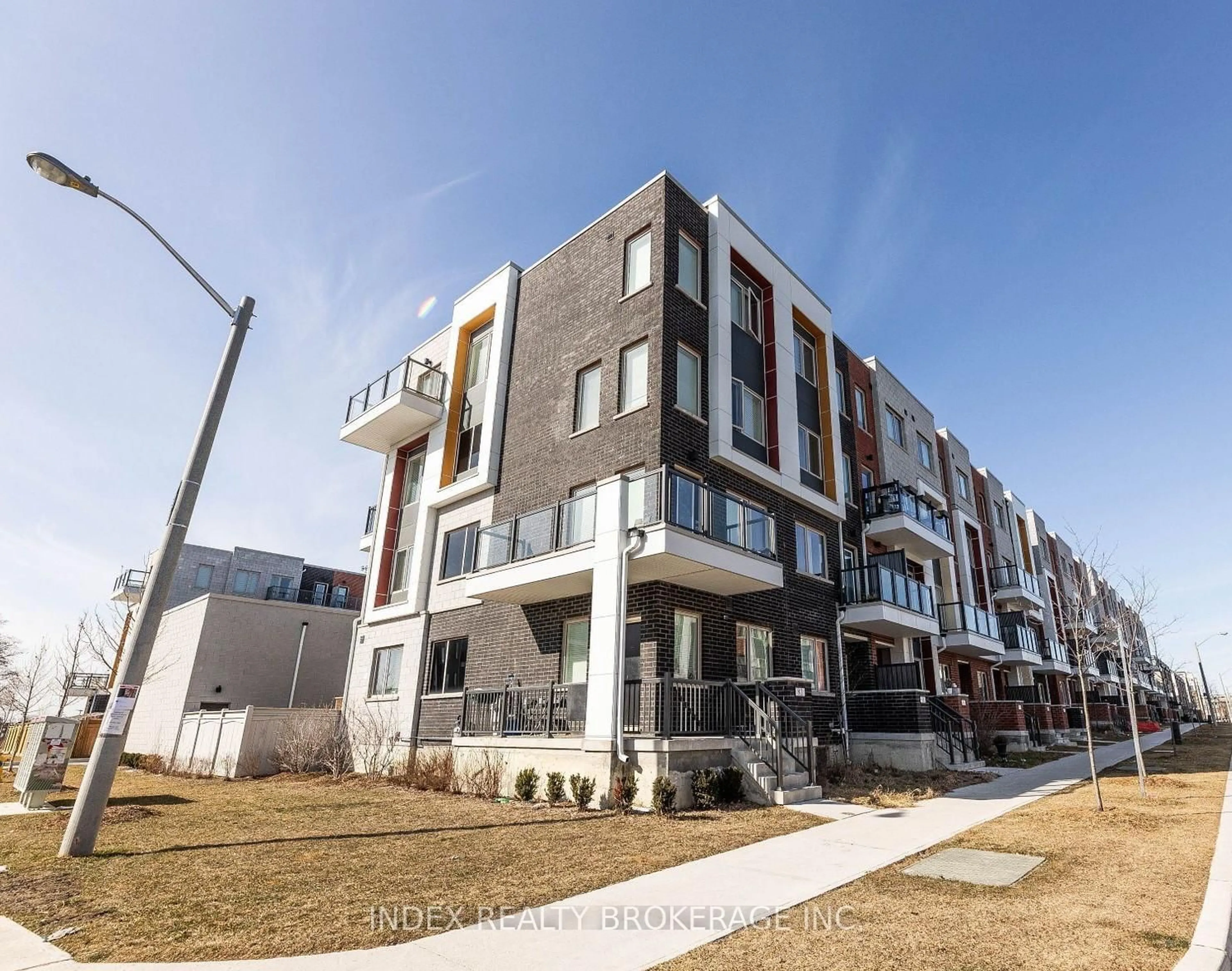 Home with brick exterior material, street for 82 William Duncan Rd, Toronto Ontario M3K 0B7