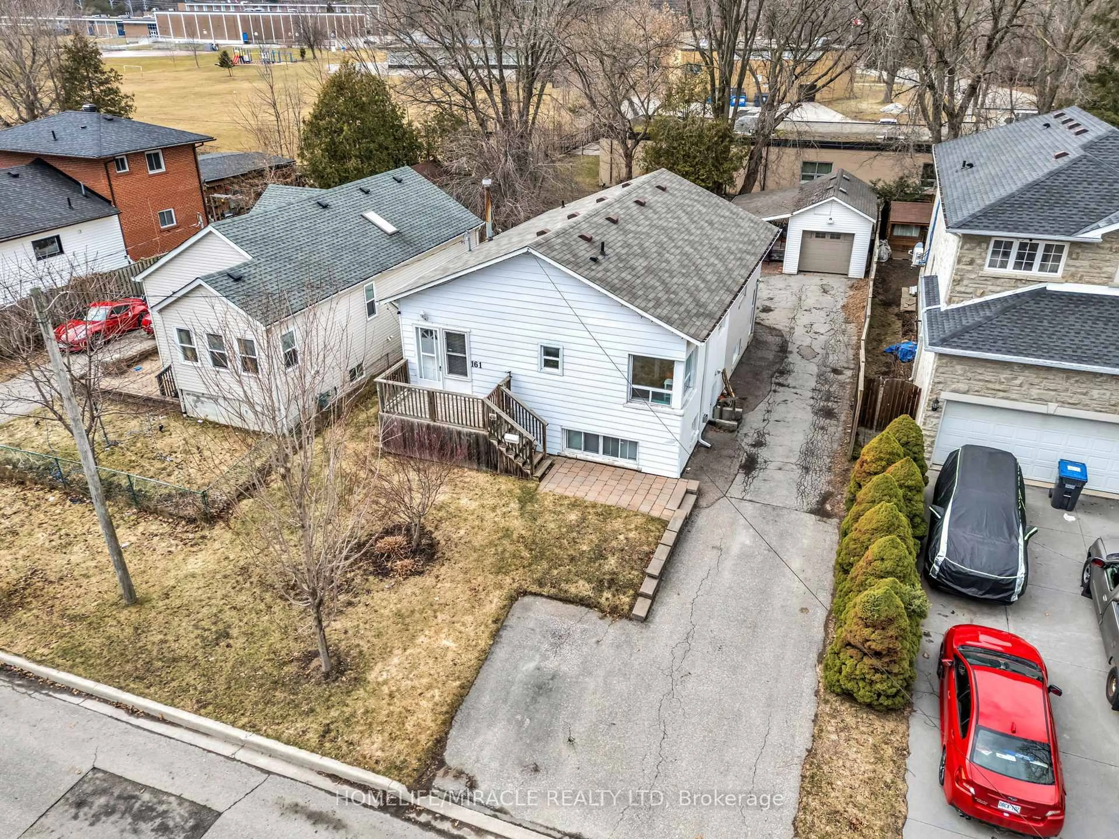 A pic from outside/outdoor area/front of a property/back of a property/a pic from drone, street for 161 Angelene St, Mississauga Ontario L5G 1X1