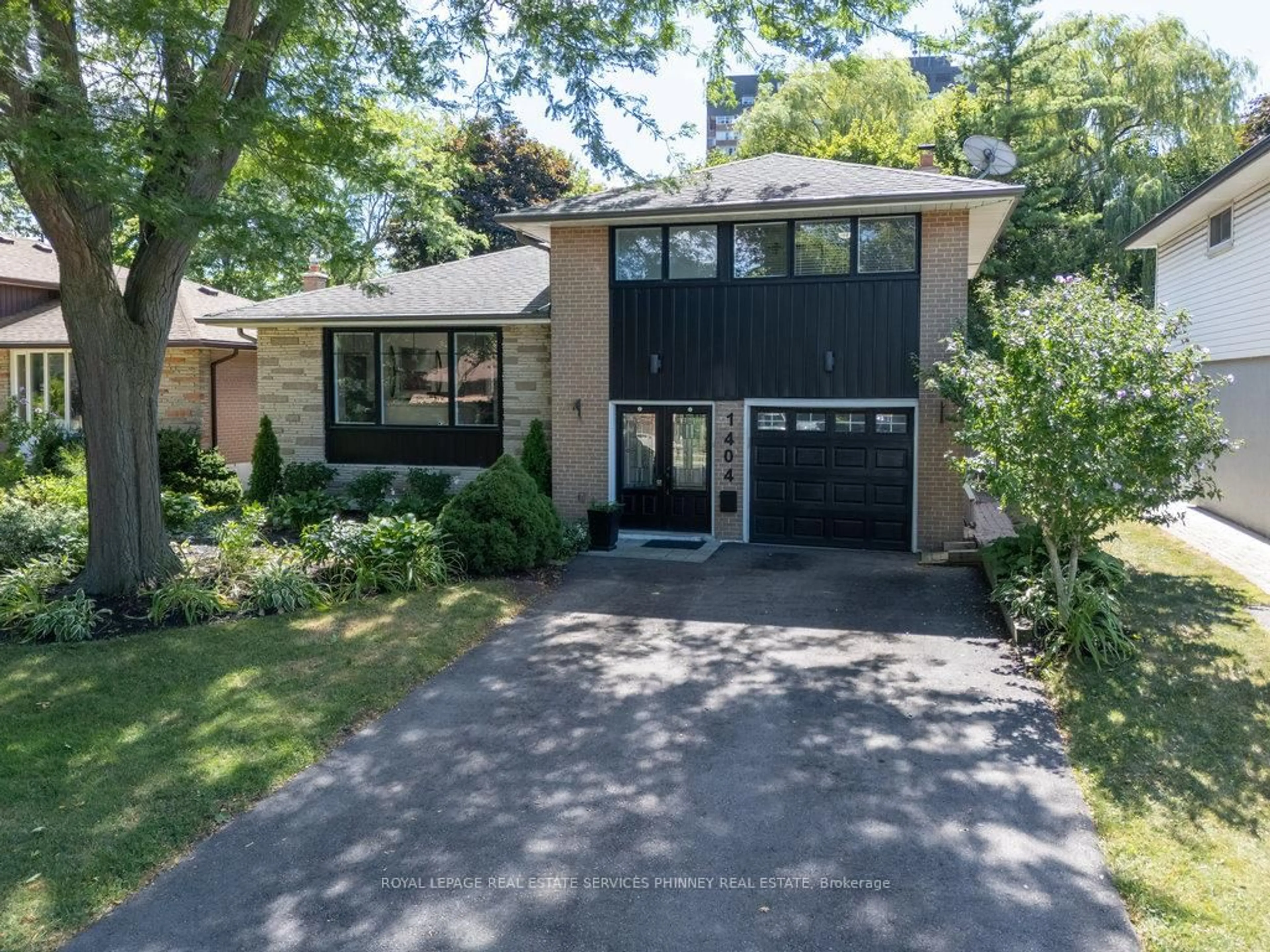 Home with brick exterior material, street for 1404 Lewisham Dr, Mississauga Ontario L5J 3R3