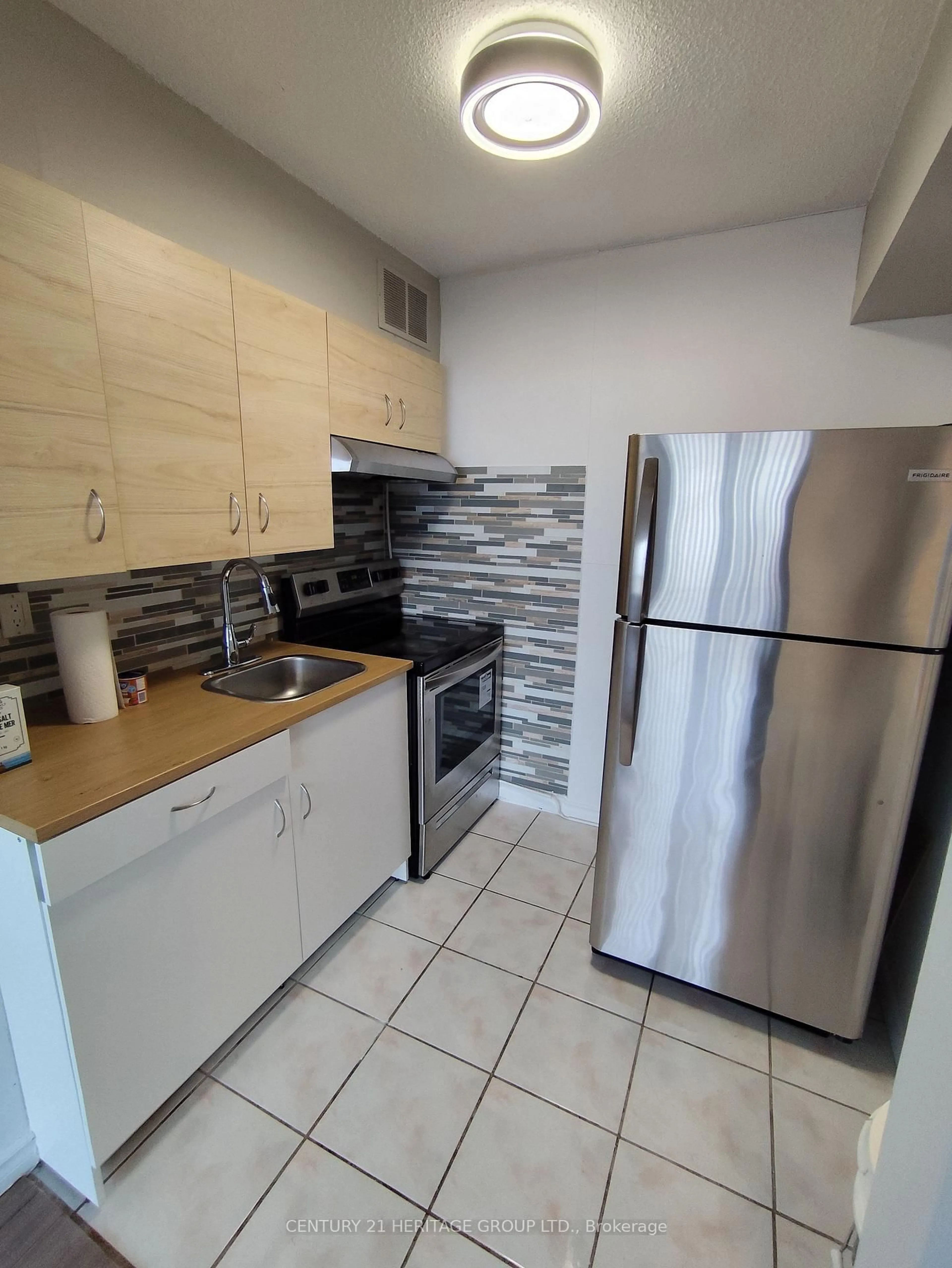 Standard kitchen, ceramic/tile floor for 100 Lotherton Ptwy #612, Toronto Ontario M6B 2G8