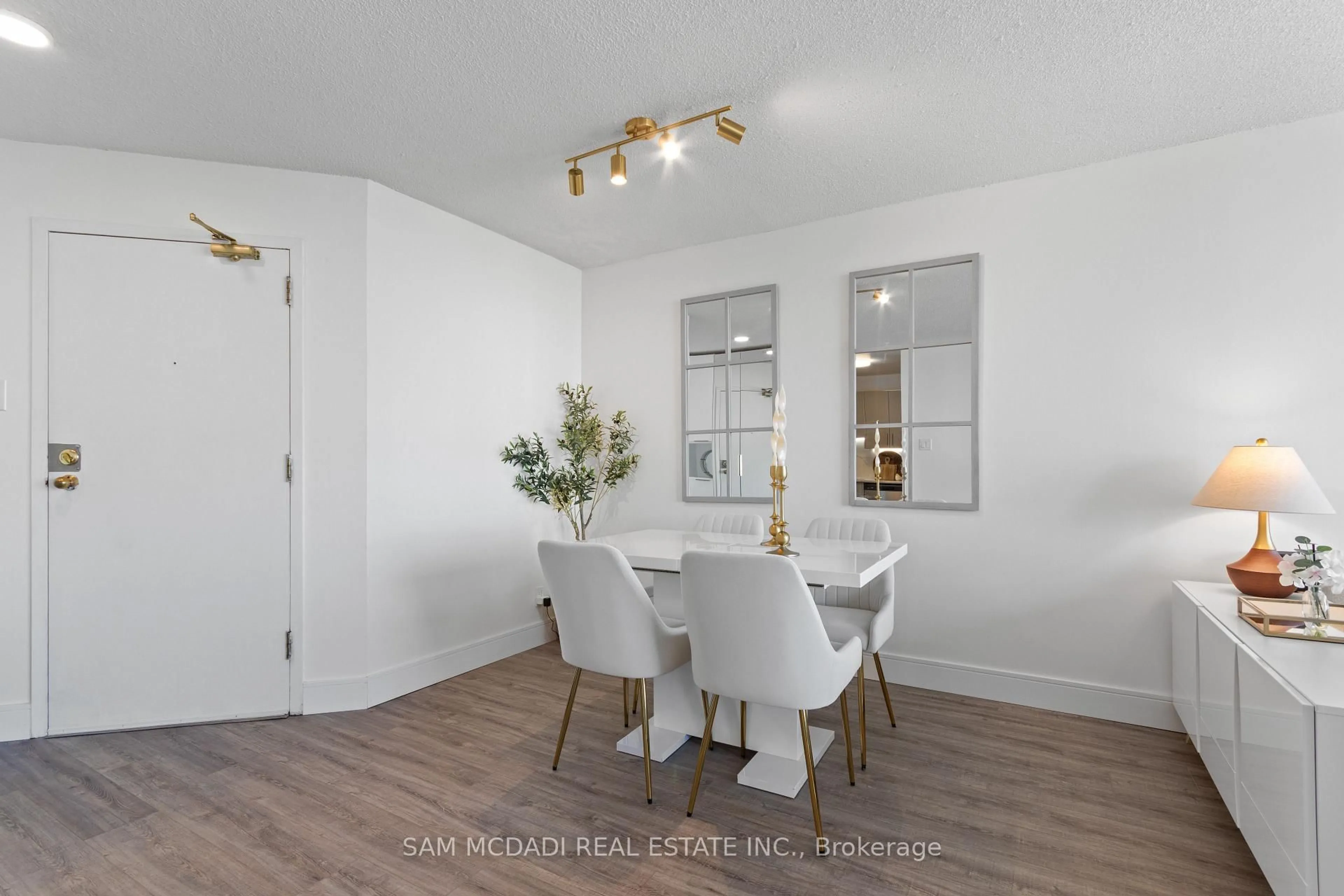 Dining room, wood/laminate floor for 35 Trailwood Dr #1111, Mississauga Ontario L4Z 3L6