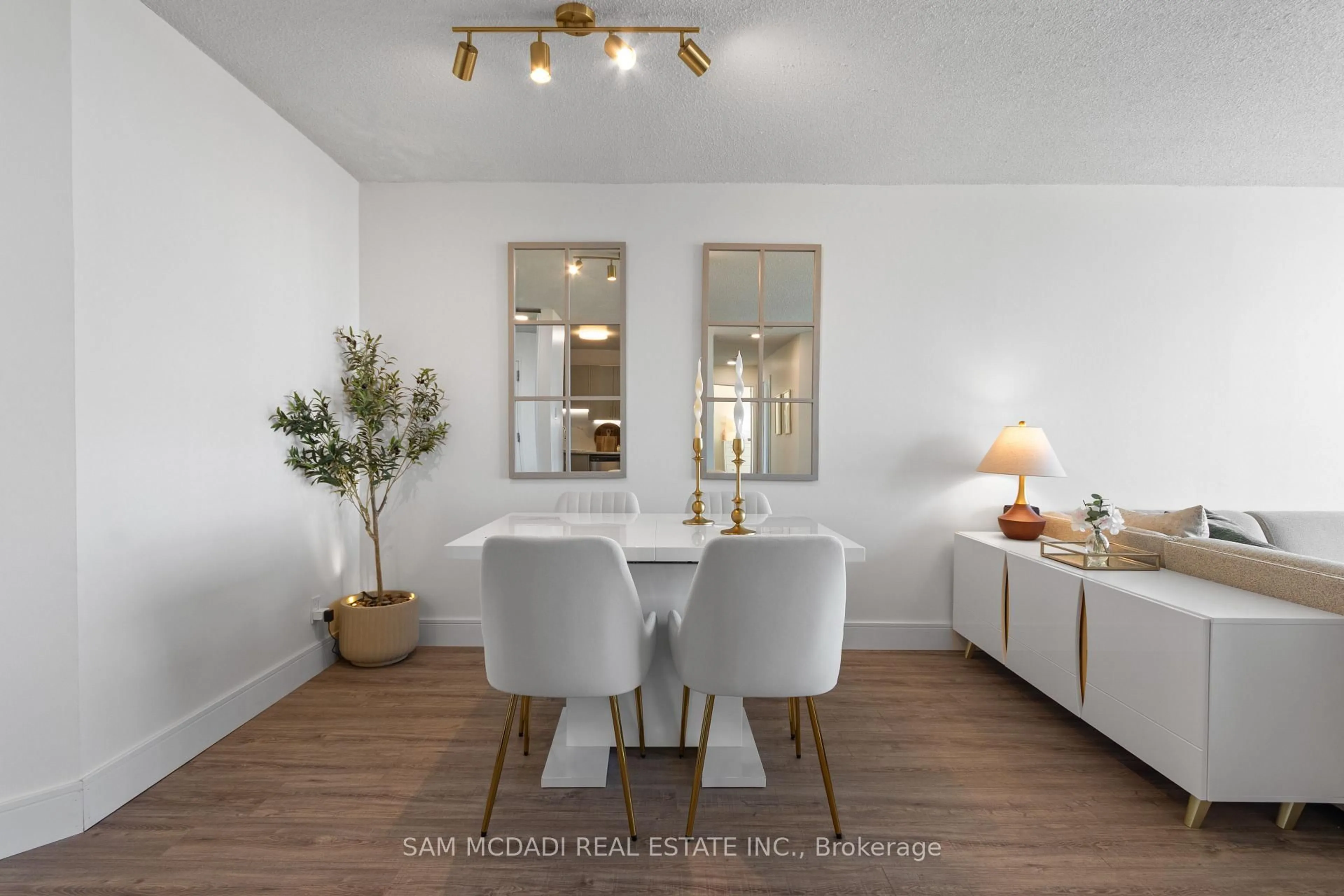 Dining room, wood/laminate floor for 35 Trailwood Dr #1111, Mississauga Ontario L4Z 3L6