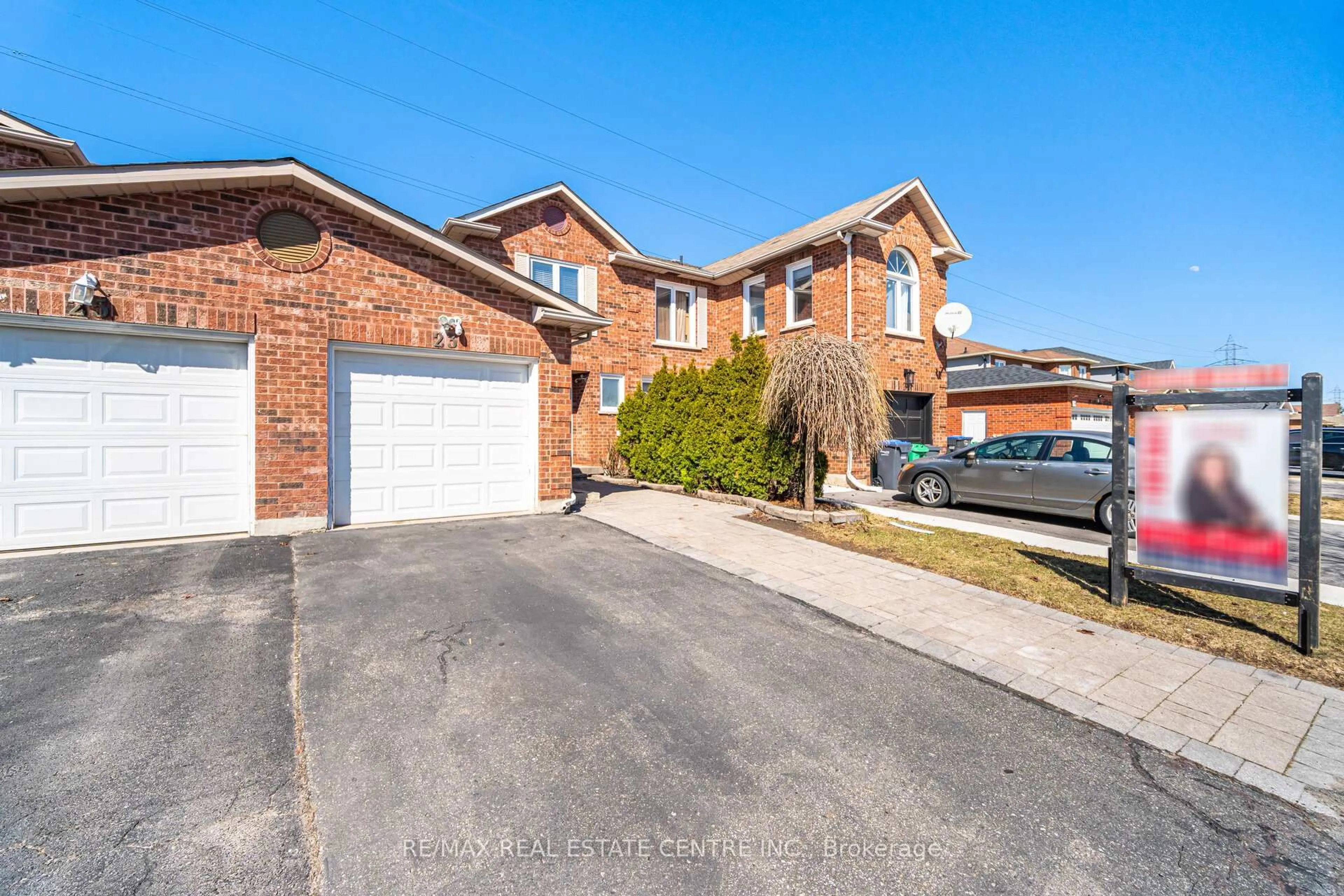 Home with brick exterior material, street for 23 Acadian Hts, Brampton Ontario L6Y 4H5
