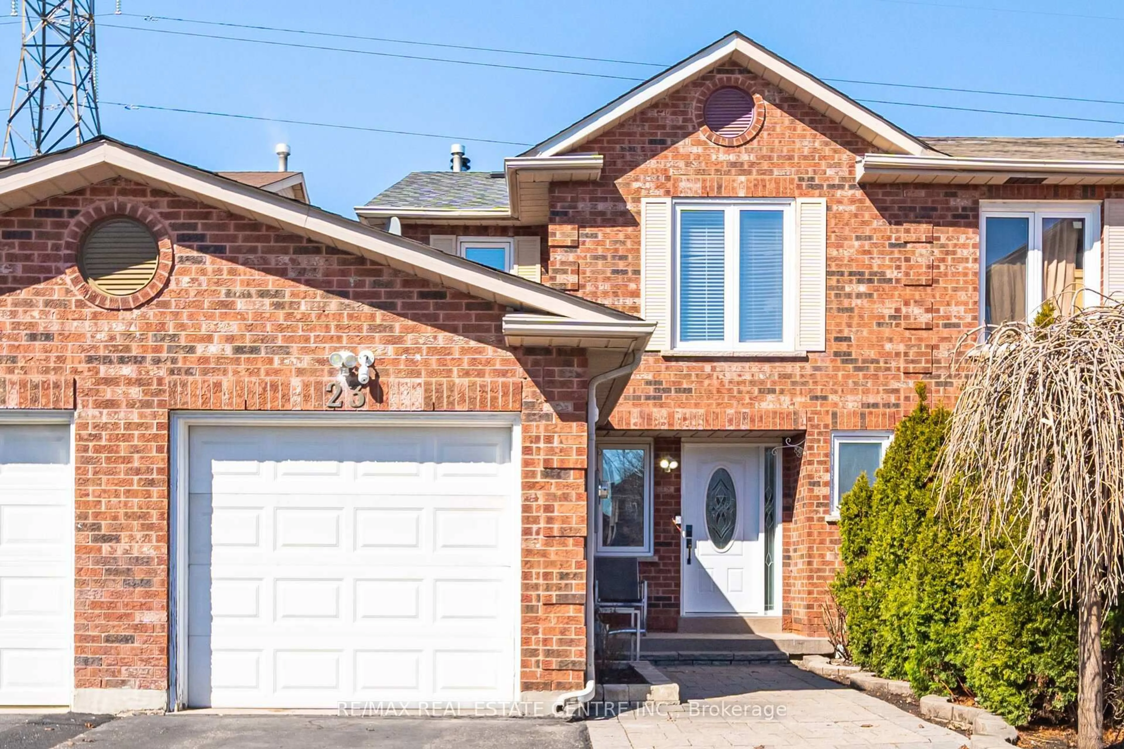 Home with brick exterior material, street for 23 Acadian Hts, Brampton Ontario L6Y 4H5