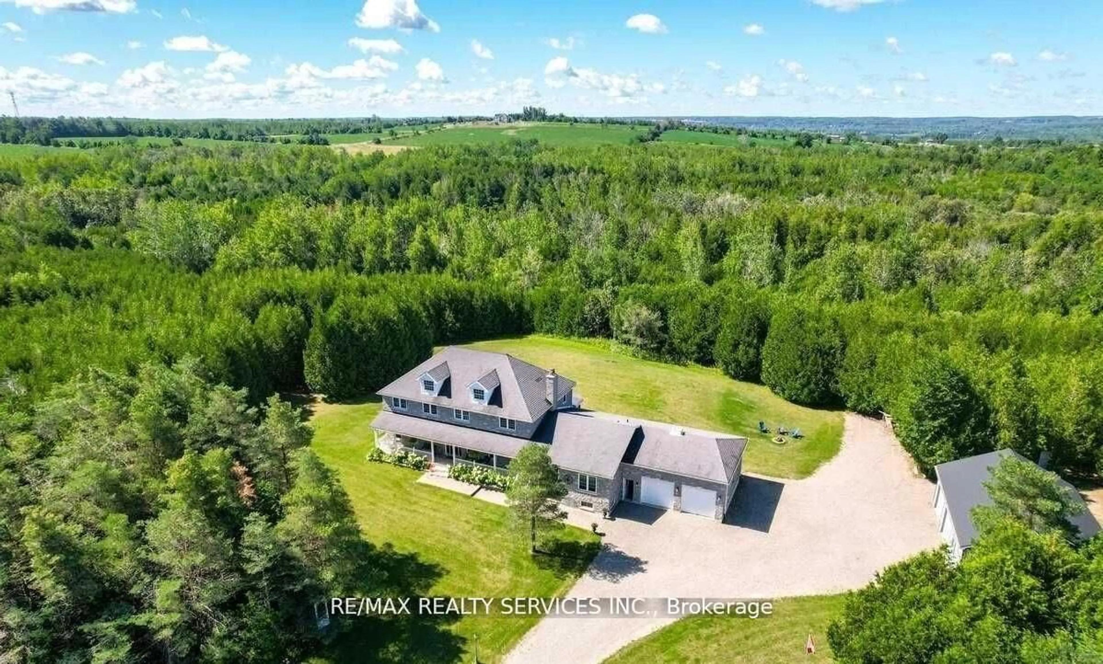A pic from outside/outdoor area/front of a property/back of a property/a pic from drone, forest/trees view for 20040 Kennedy Rd, Caledon Ontario L7K 1Y3
