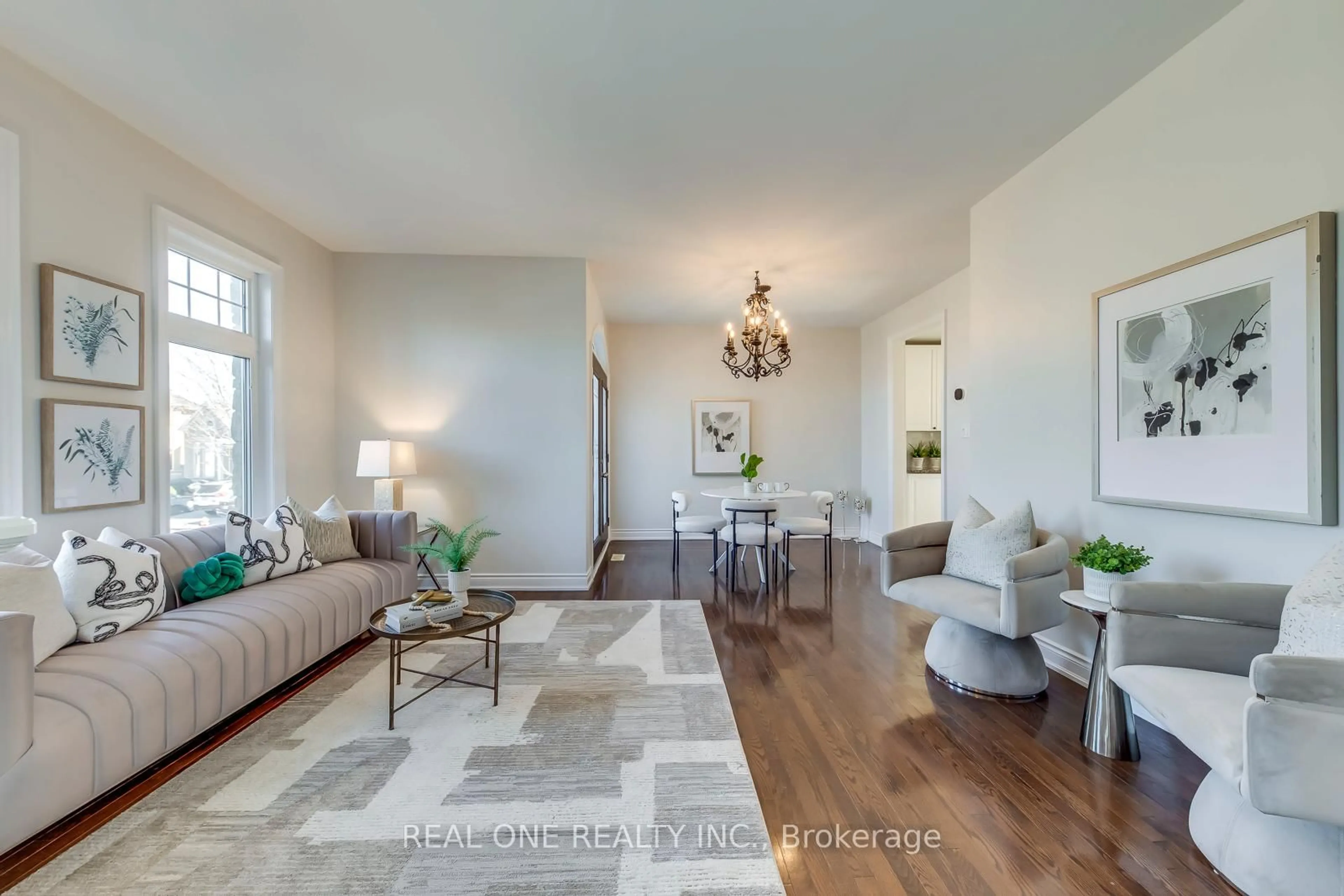 Living room with furniture, wood/laminate floor for 1426 Redwing Crt, Oakville Ontario L6M 5E6