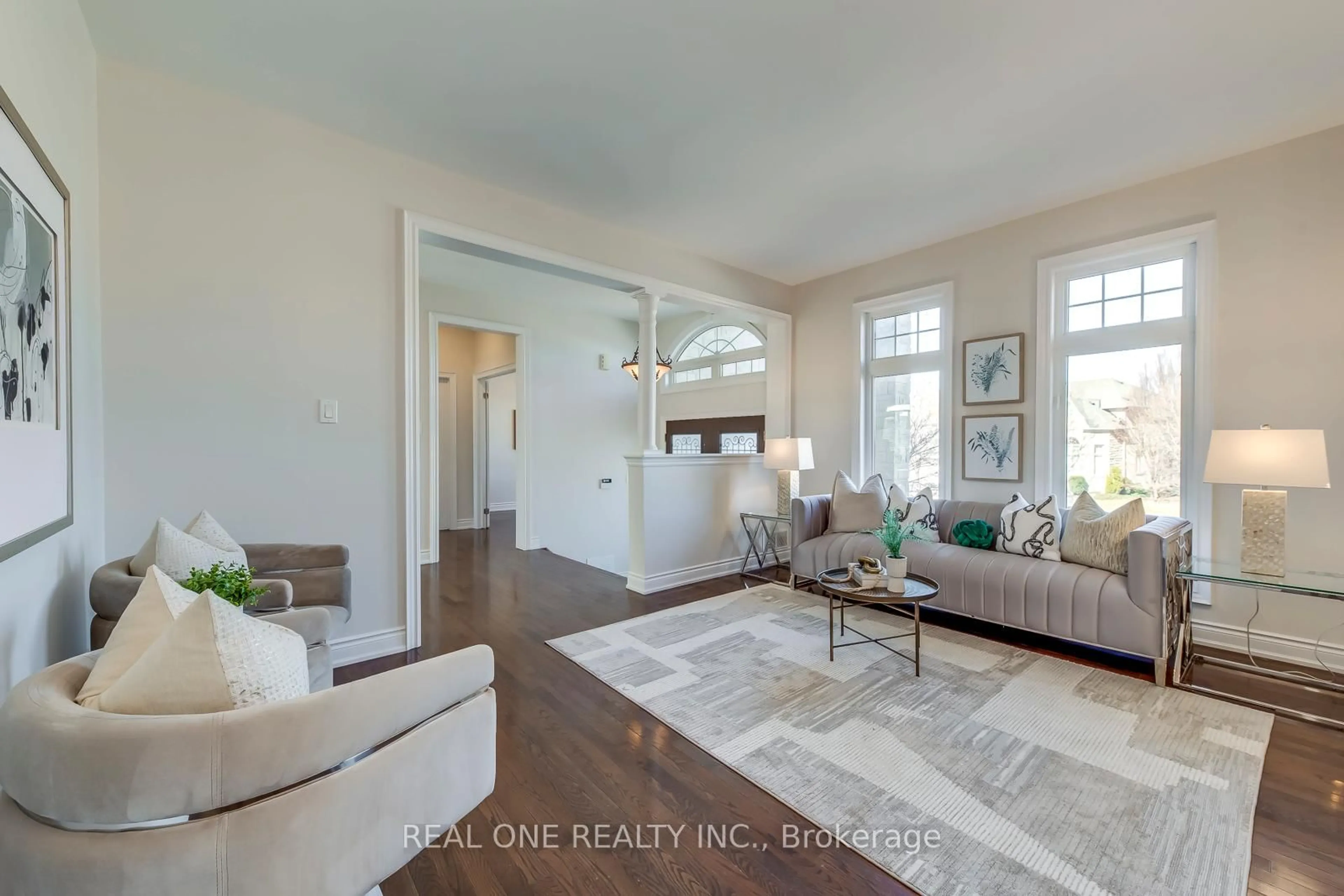 Living room with furniture, wood/laminate floor for 1426 Redwing Crt, Oakville Ontario L6M 5E6