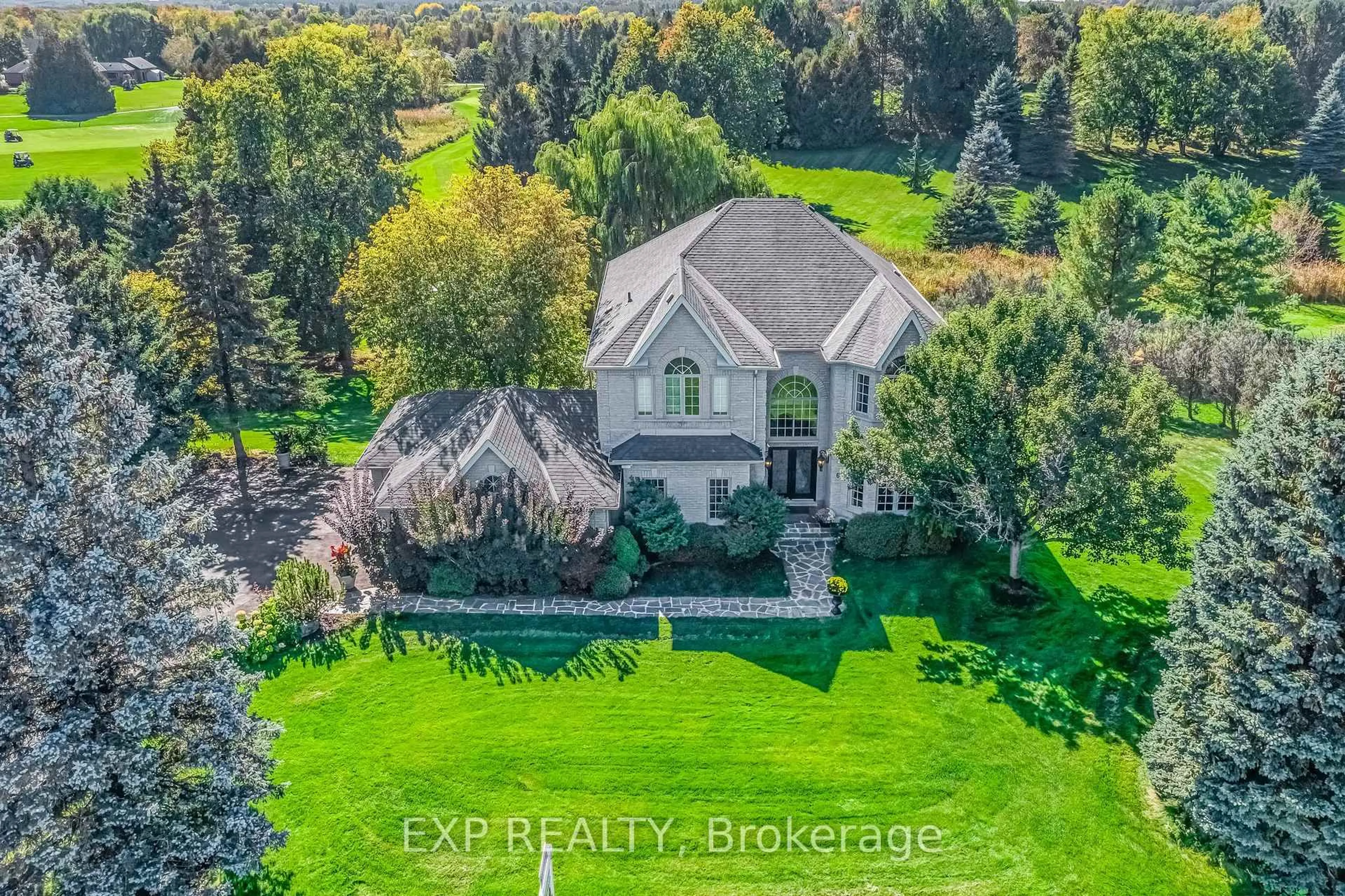 A pic from outside/outdoor area/front of a property/back of a property/a pic from drone, water/lake/river/ocean view for 6 Golfway Crt, Caledon Ontario L7E 0B3