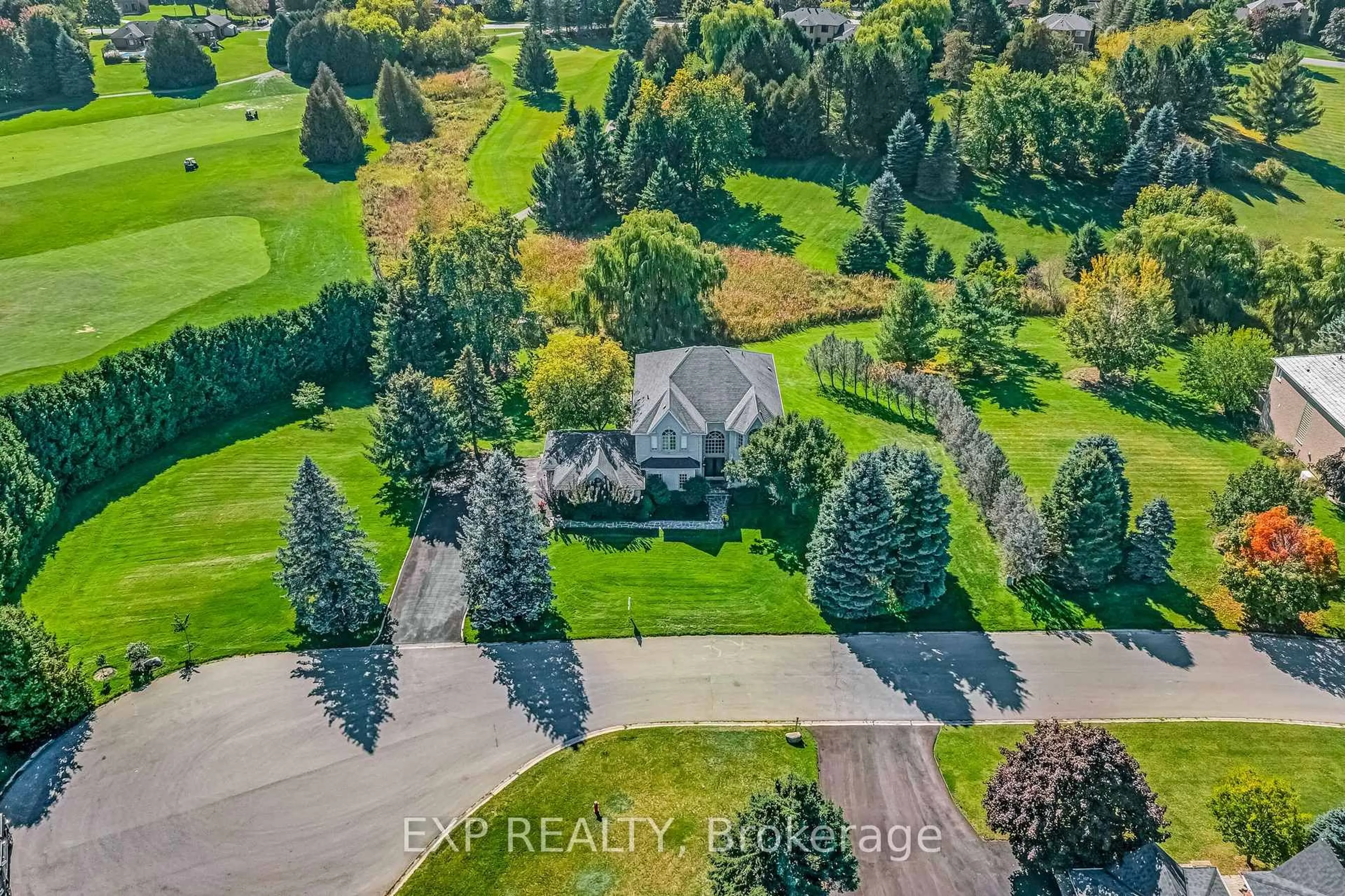 A pic from outside/outdoor area/front of a property/back of a property/a pic from drone, forest/trees view for 6 Golfway Crt, Caledon Ontario L7E 0B3