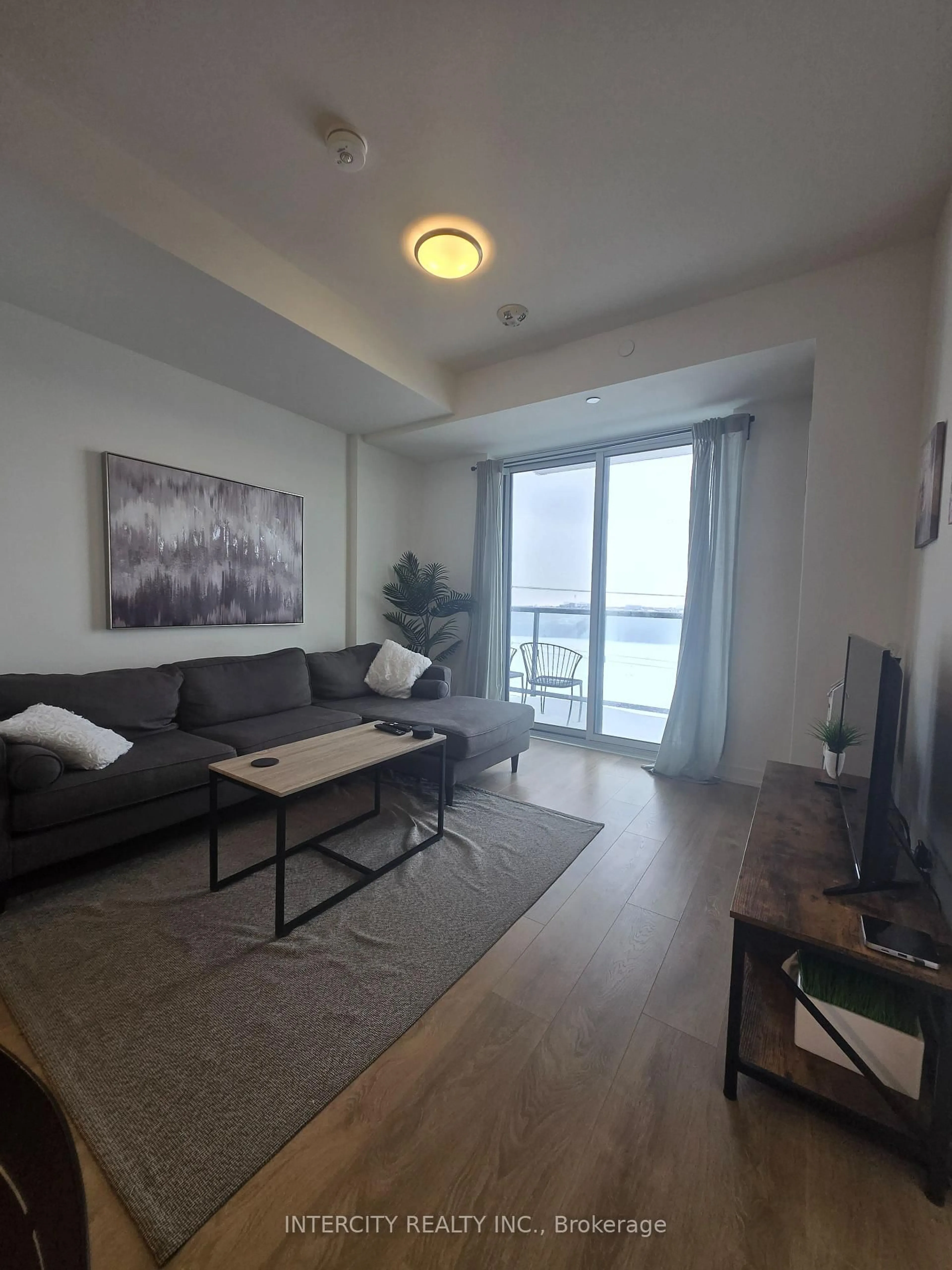 Living room with furniture, unknown for 345 Wheat Boom Dr #505, Oakville Ontario L6H 7X4