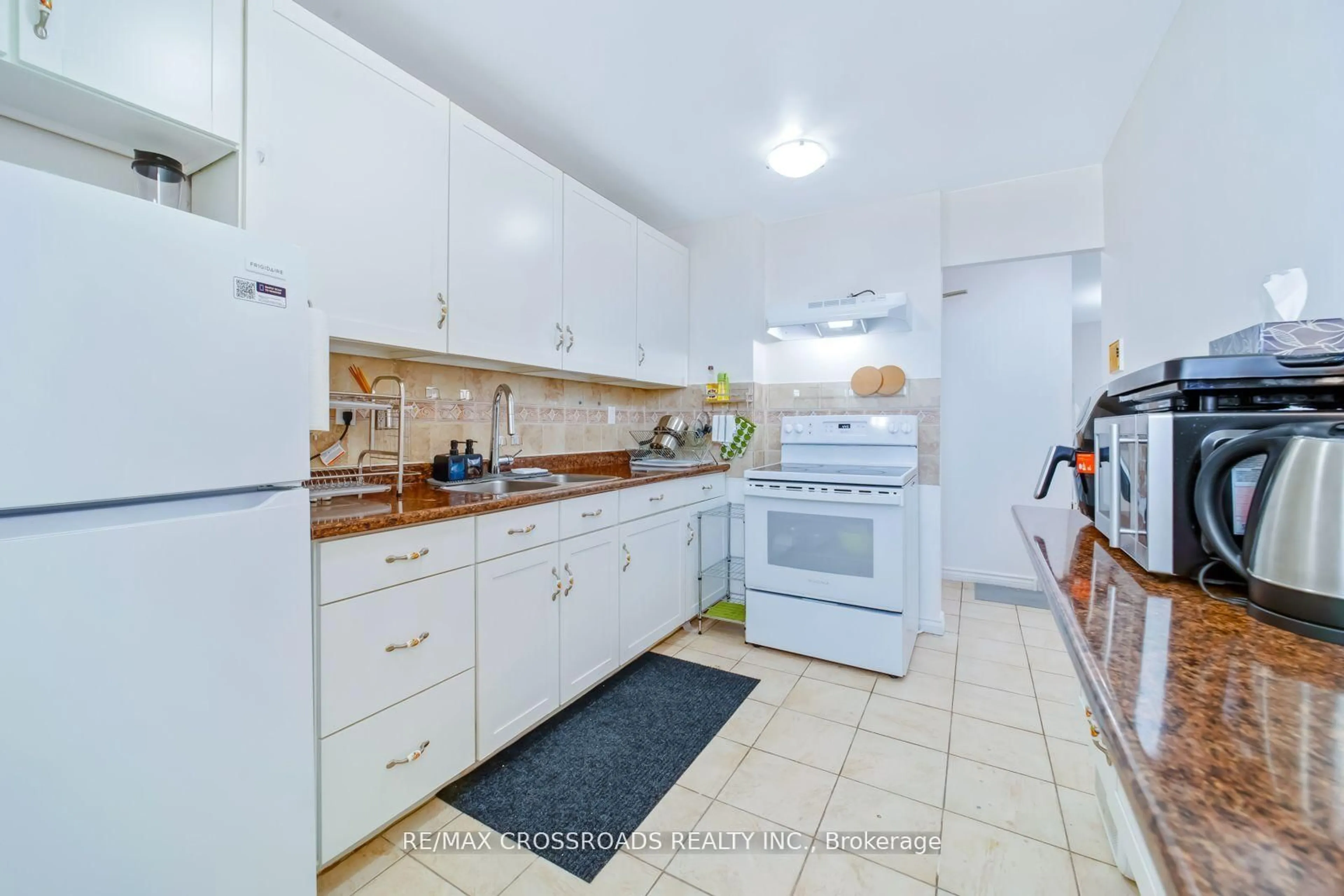 Standard kitchen, ceramic/tile floor for 340 Dixon Rd #1208, Toronto Ontario M9R 1T1