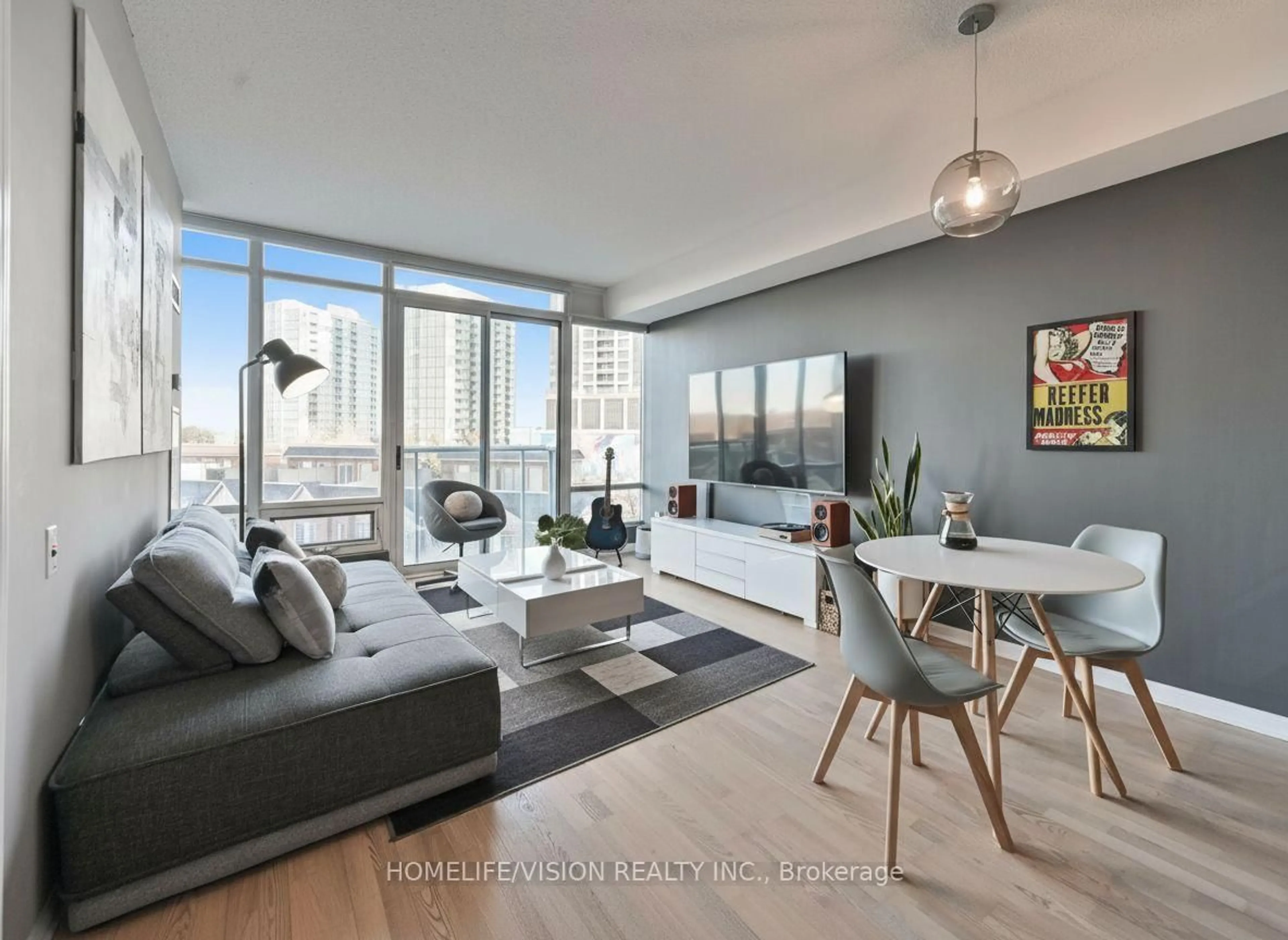 Living room with furniture, wood/laminate floor for 15 Windermere Ave #508, Toronto Ontario M6S 5A2